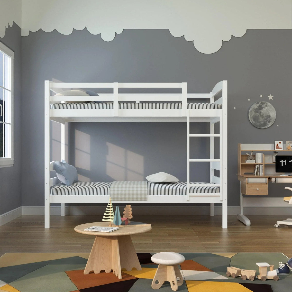 White twin-over-twin bunk bed with ladder and two mattresses in a kids room
