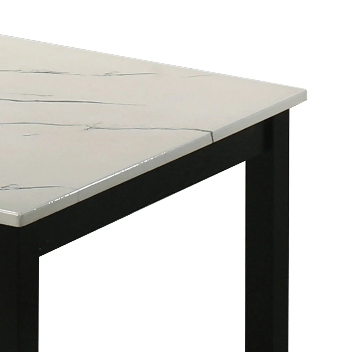 Light faux marble tabletop corner with black frame legs, stone-look detail close-up