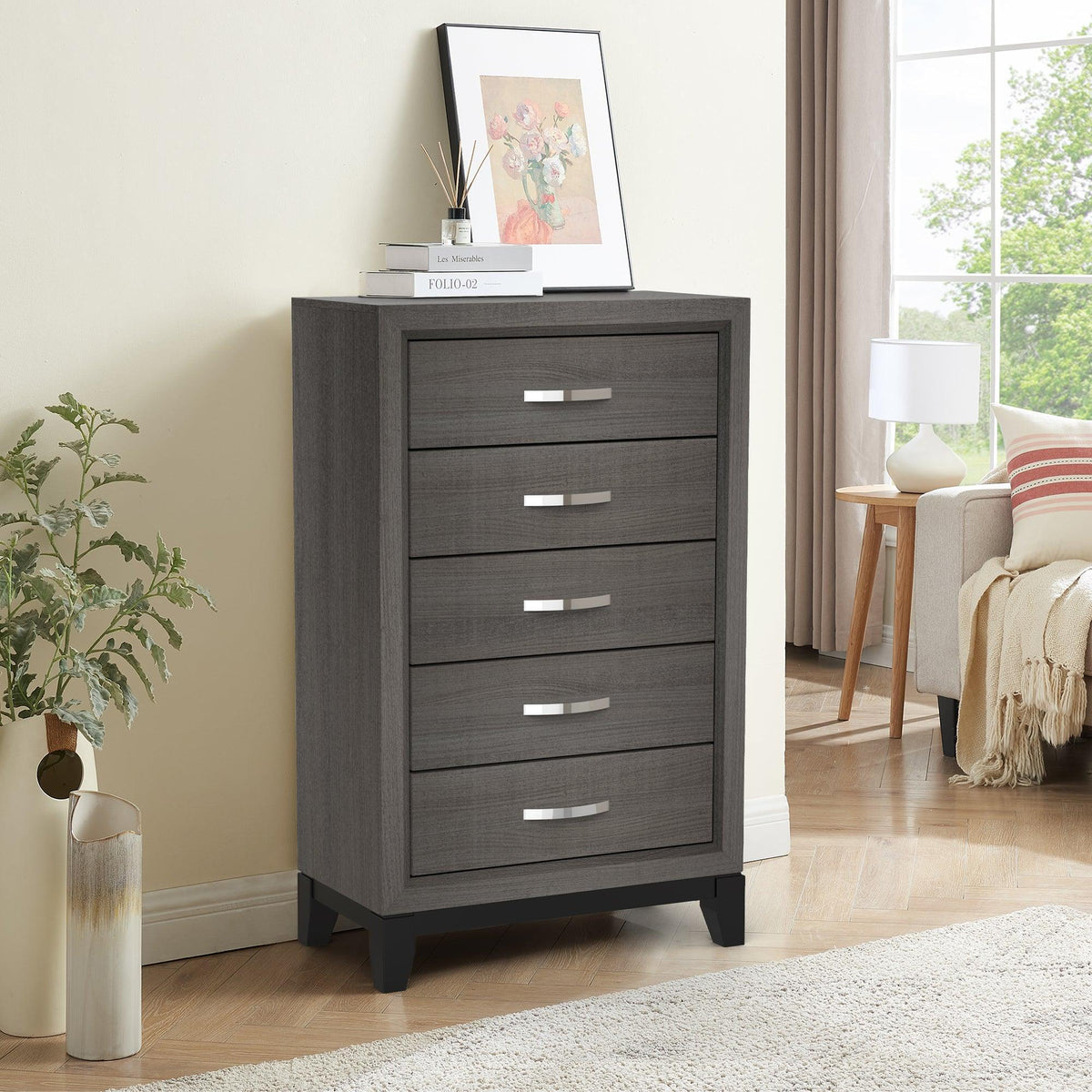 Grey 5-drawer chest with metal bar pulls and dark wooden legs, freestanding