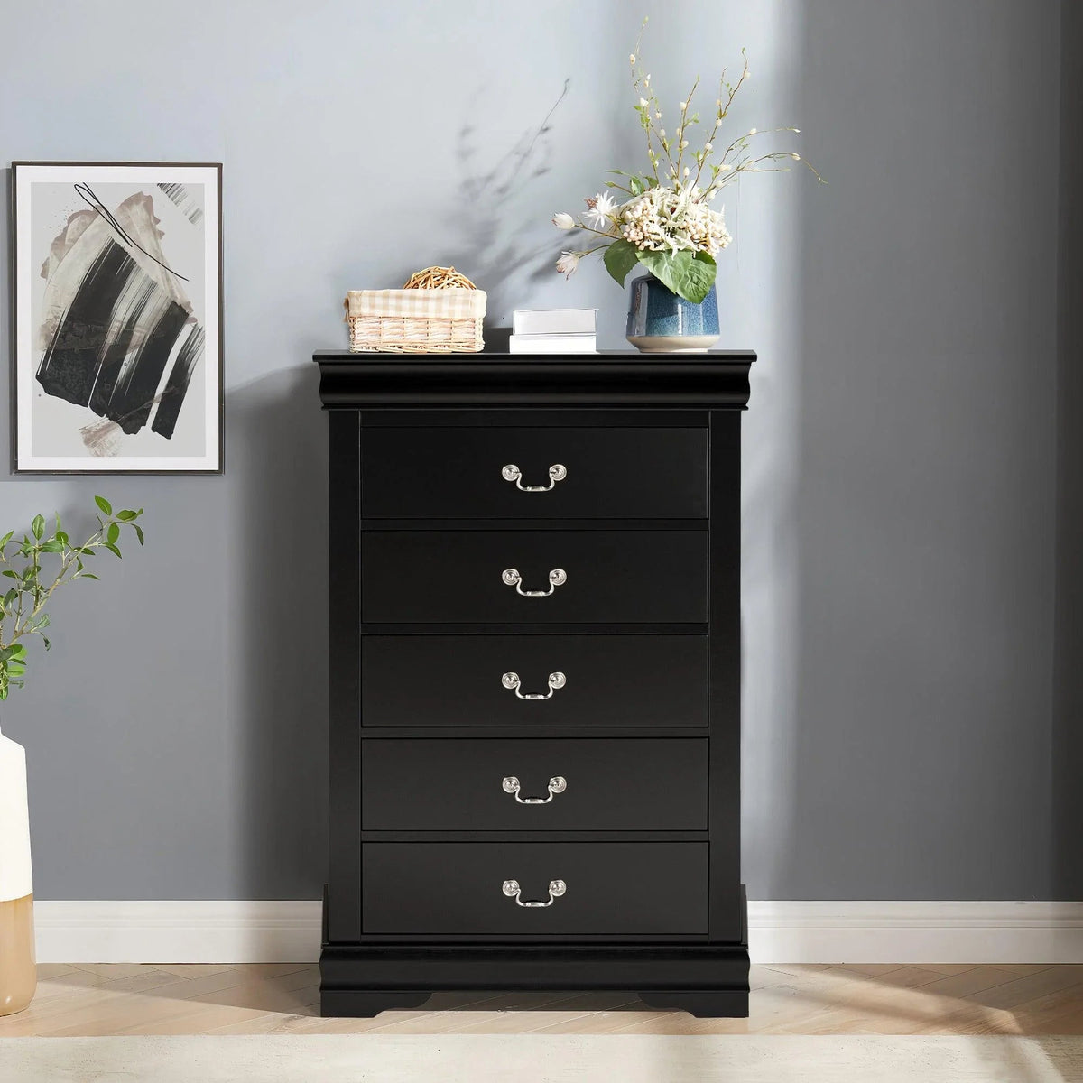 Black 5-drawer chest of drawers with metal knob pulls and bracket feet, transitional