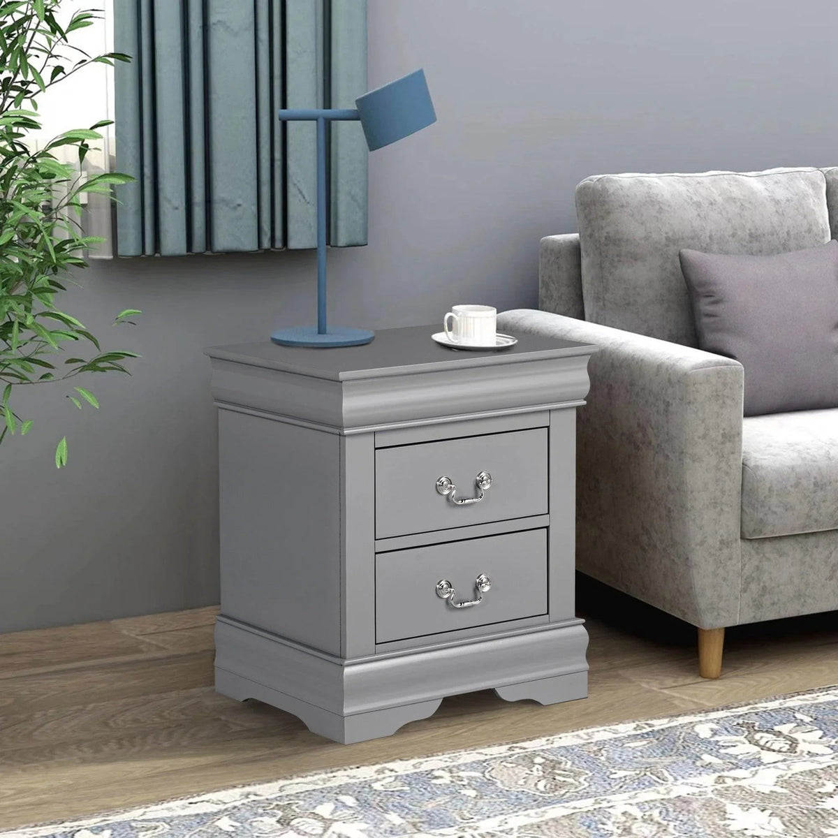 Light gray night stand with two drawers, curved metal pulls, tapered legs style