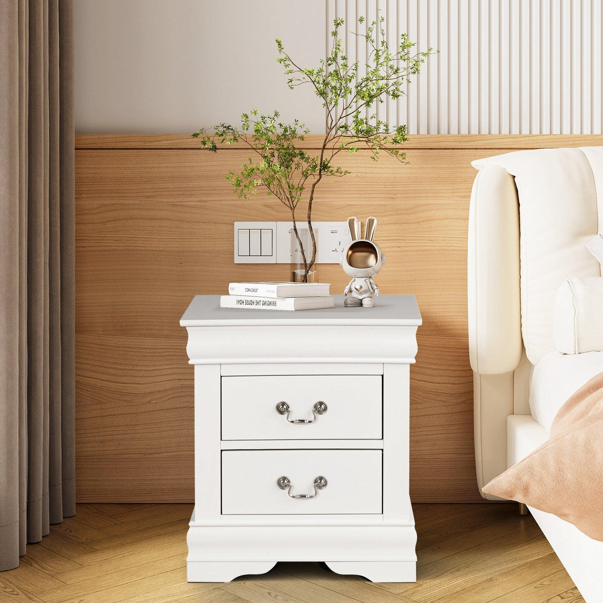 White nightstand with two drawers and decorative turned legs