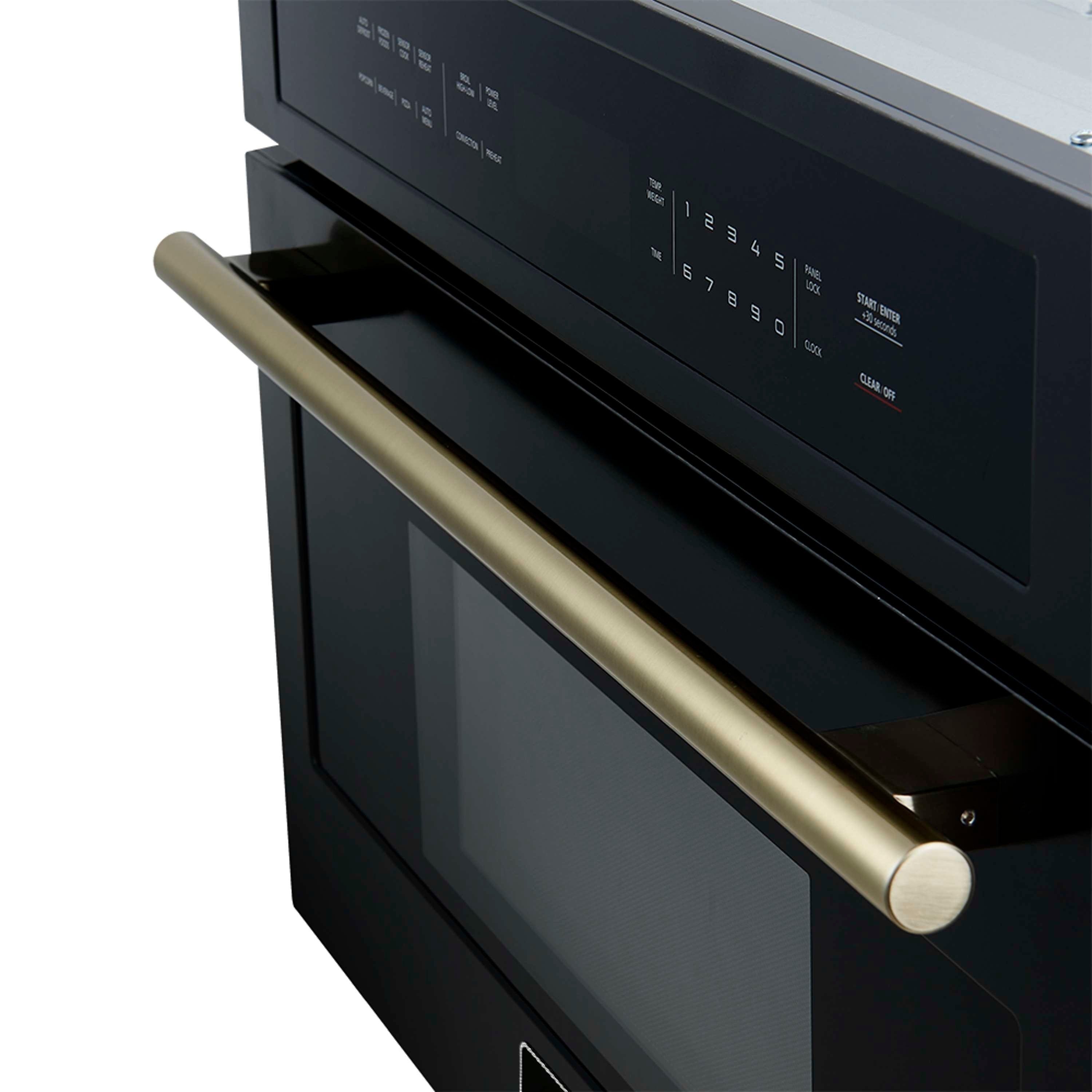 Black oven door with gold bar handle and control panel with buttons