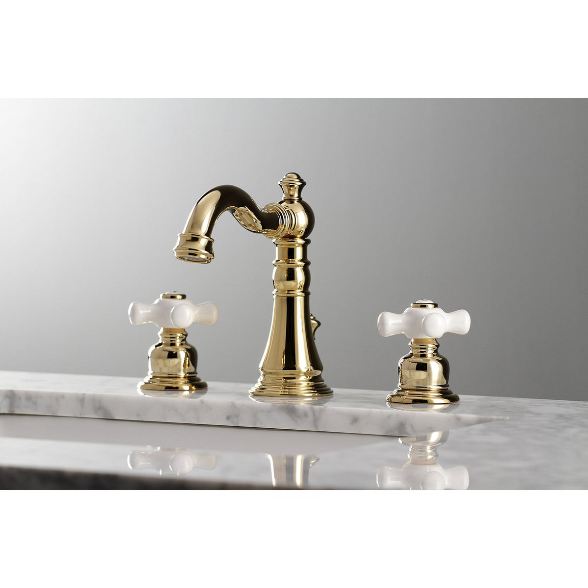 American Classic Widespread Bathroom Faucet with Pop-Up Drain in Polished Brass