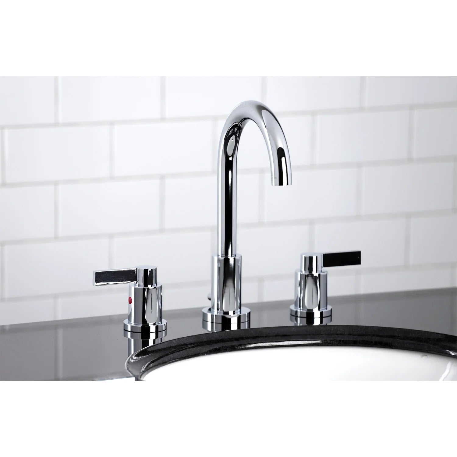 Polished chrome bathroom faucet with arched spout and three handles