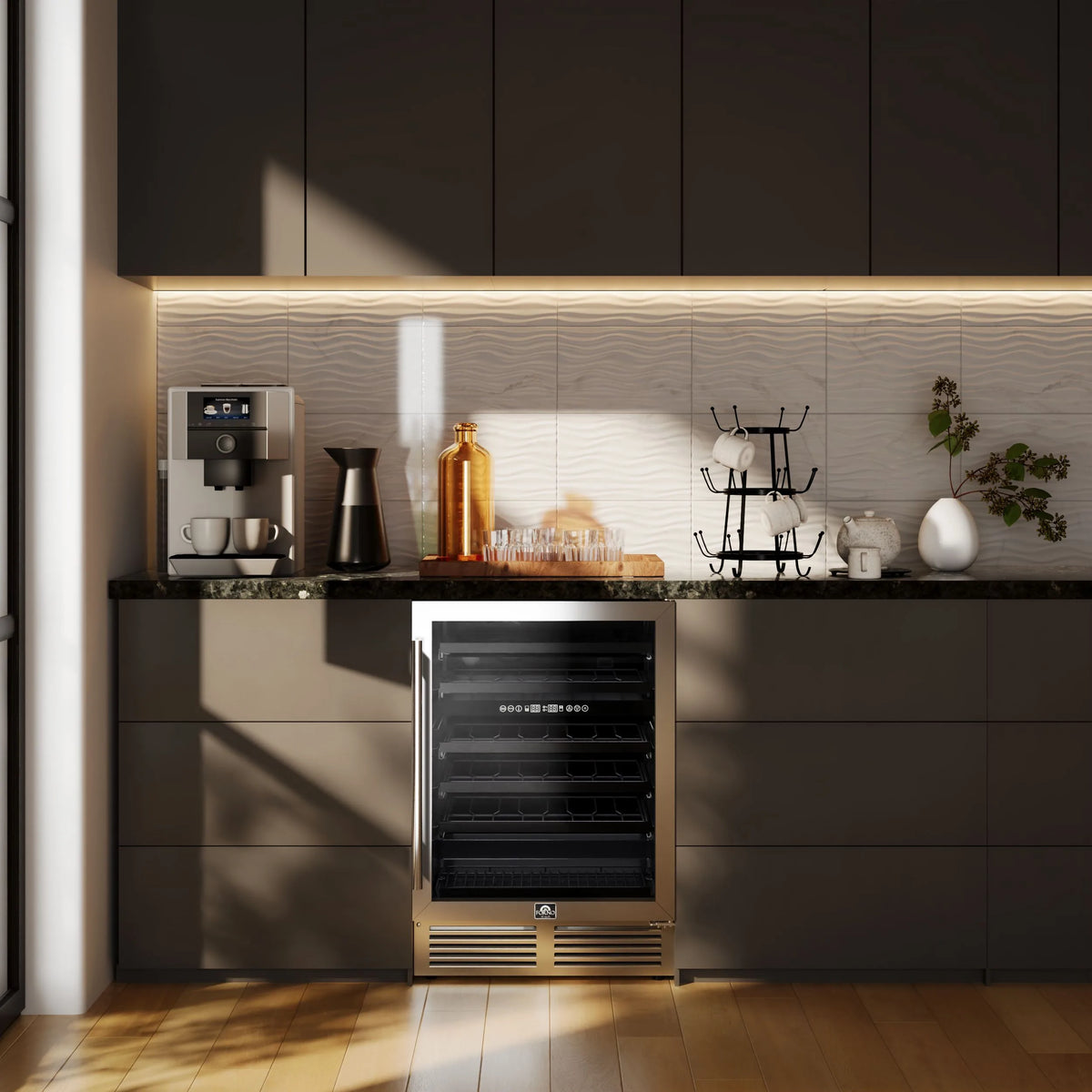 Forno Bachino 24-Inch Built-In or Freestanding Wine Cooler in Stainless Steel with LED Lighting, Triple Glass Door, & 51 Bottle Capacity shown in a styled kitchen