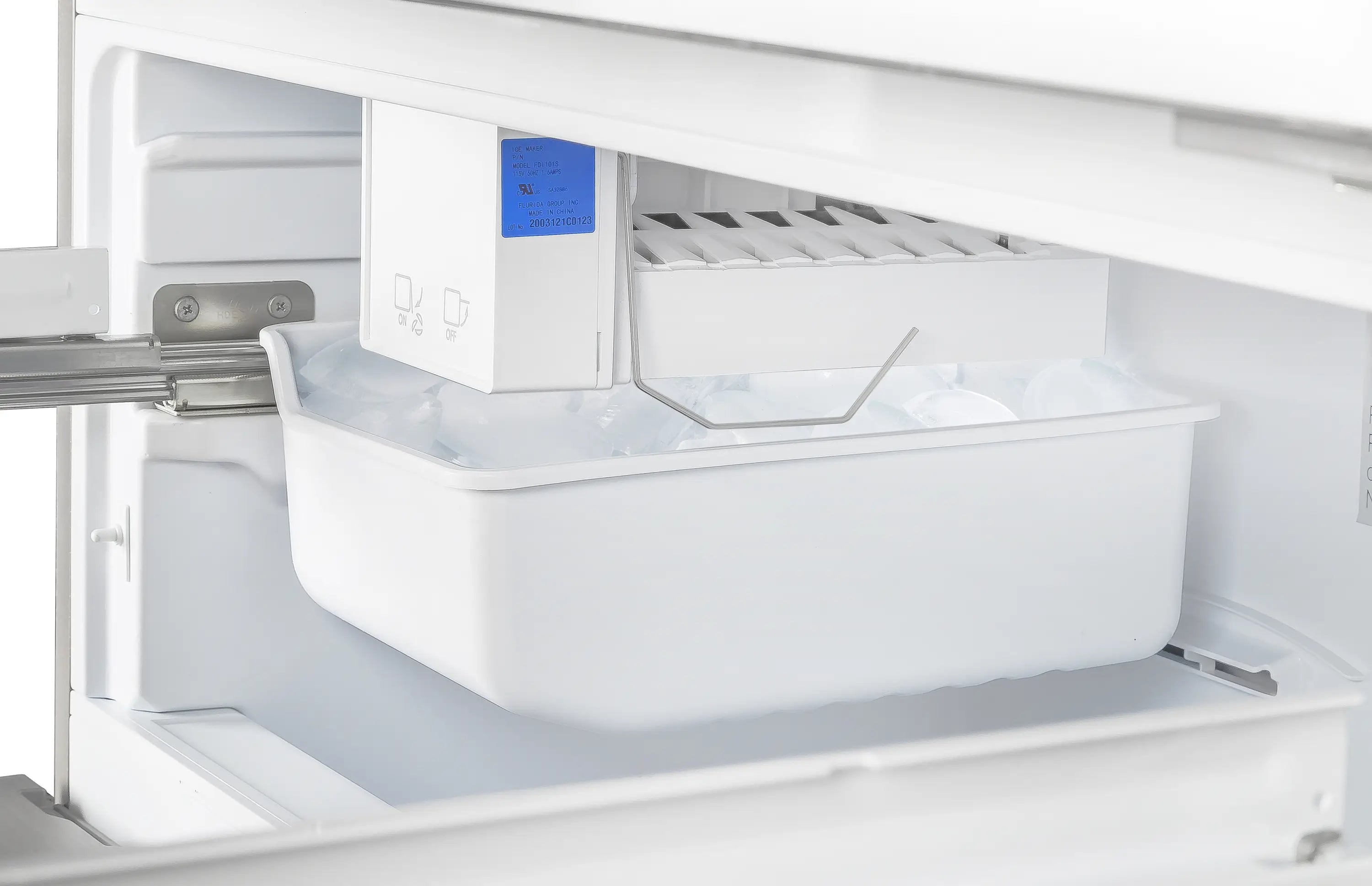 Refrigerator ice bin area with interior tray and shelves visible