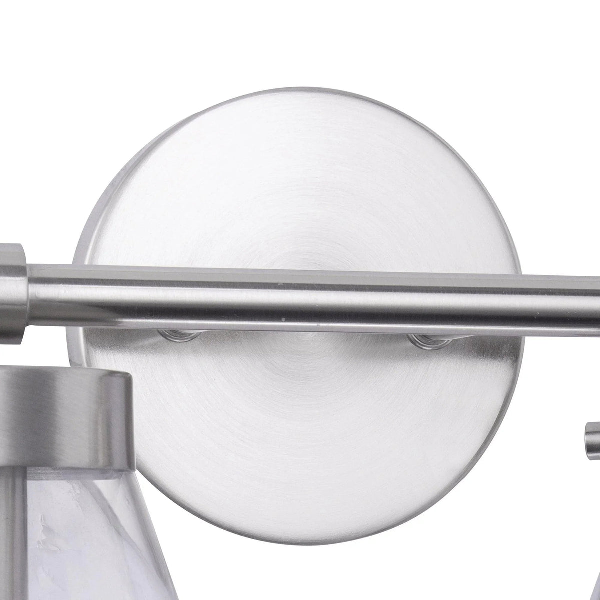 Brush nickel 2-light vanity light with round backplate and metal arm with clear glass shade