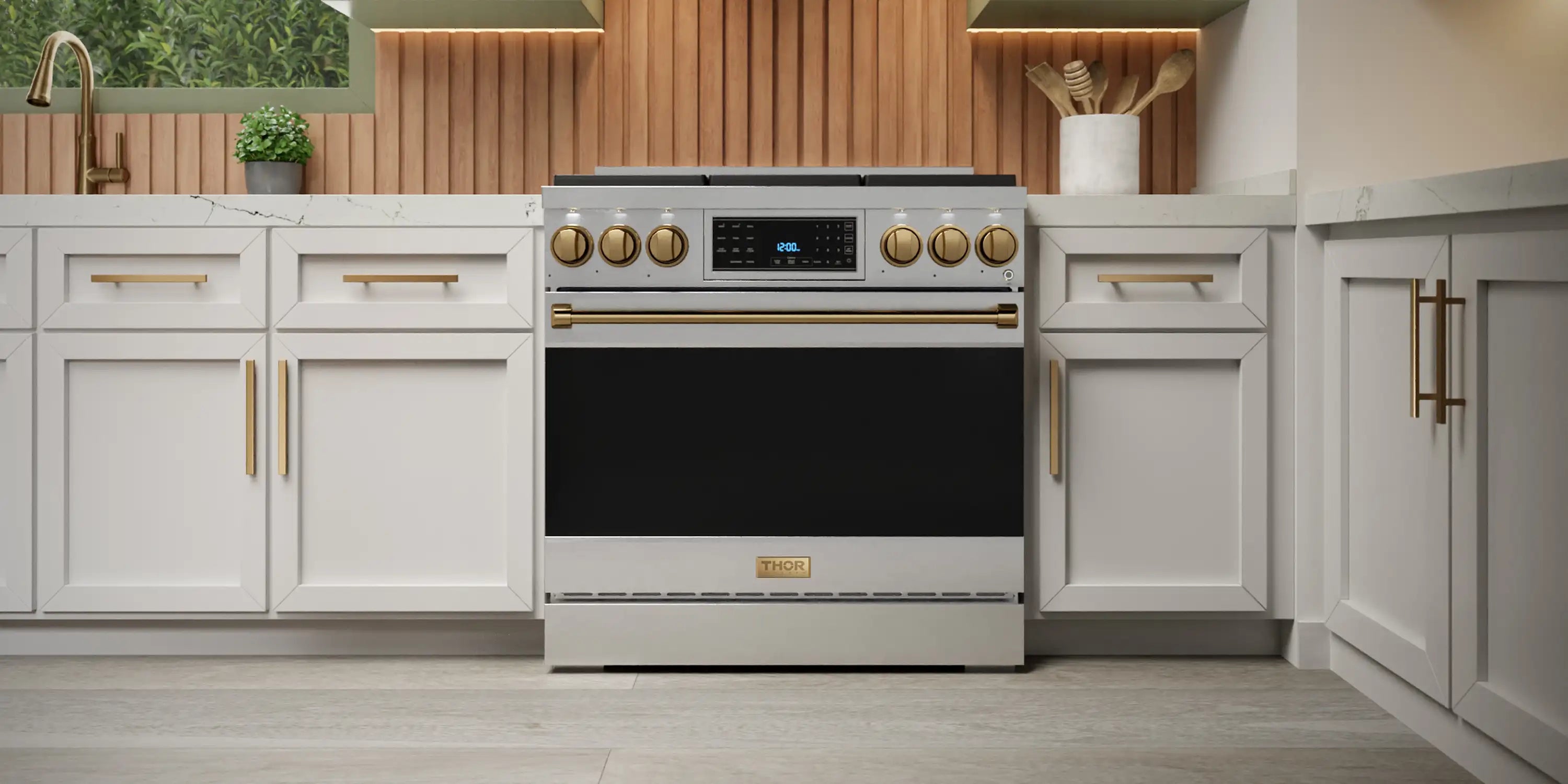 Stainless steel 36-inch gas range with tilt panel and bronze control knobs