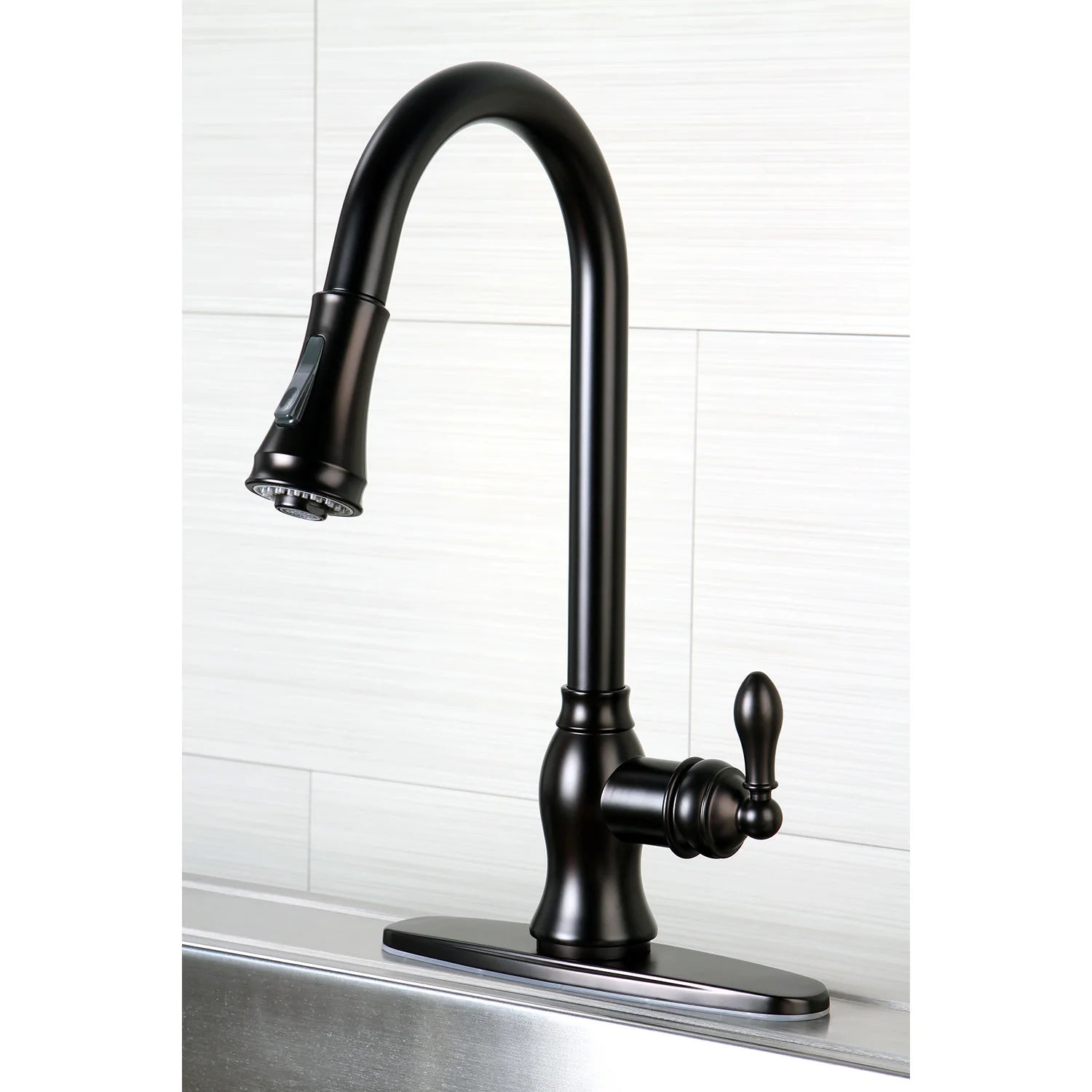 Oil-rubbed bronze single-handle kitchen faucet with pull-down spout and deck plate