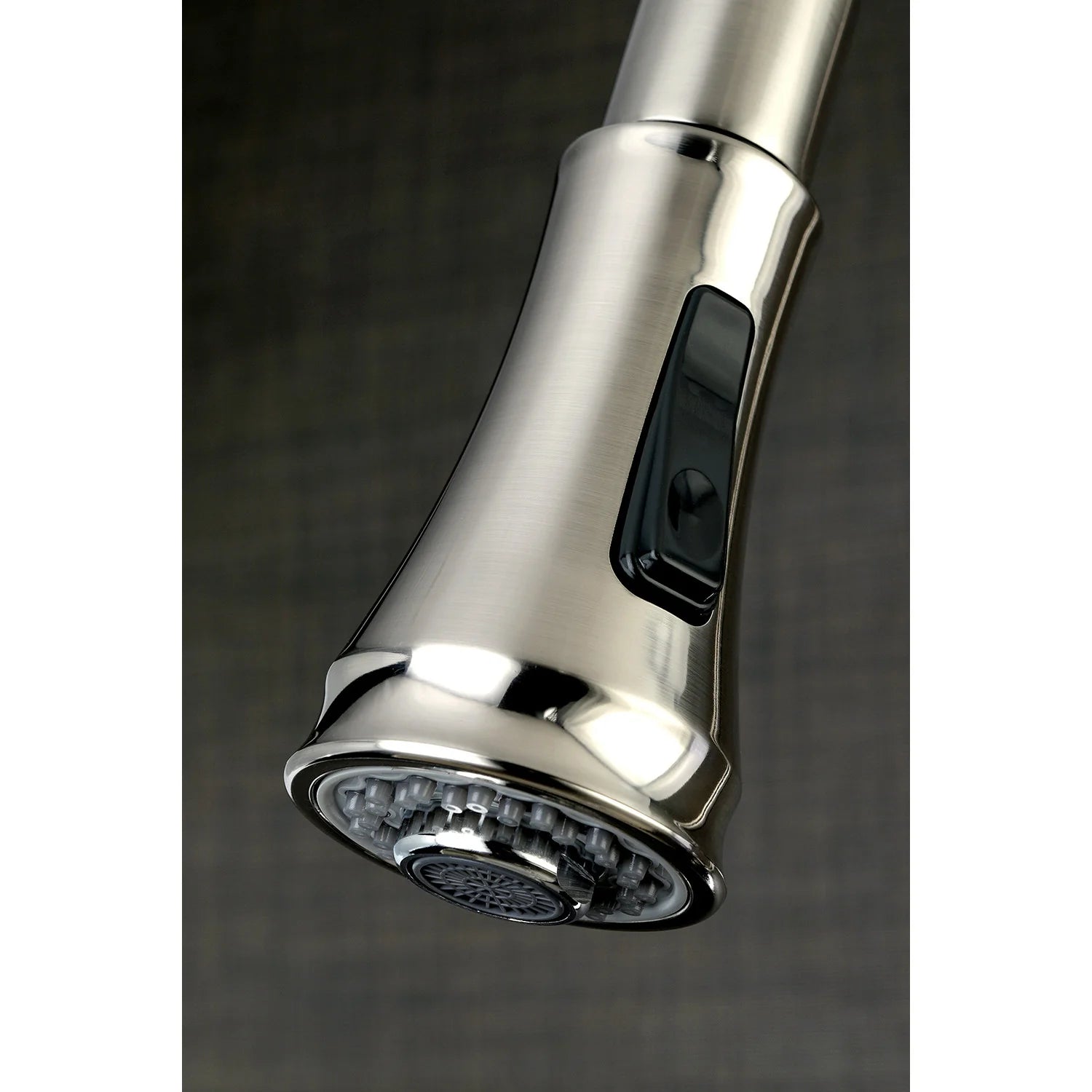 Brushed nickel pull-down sprayer head underside with spray nozzles