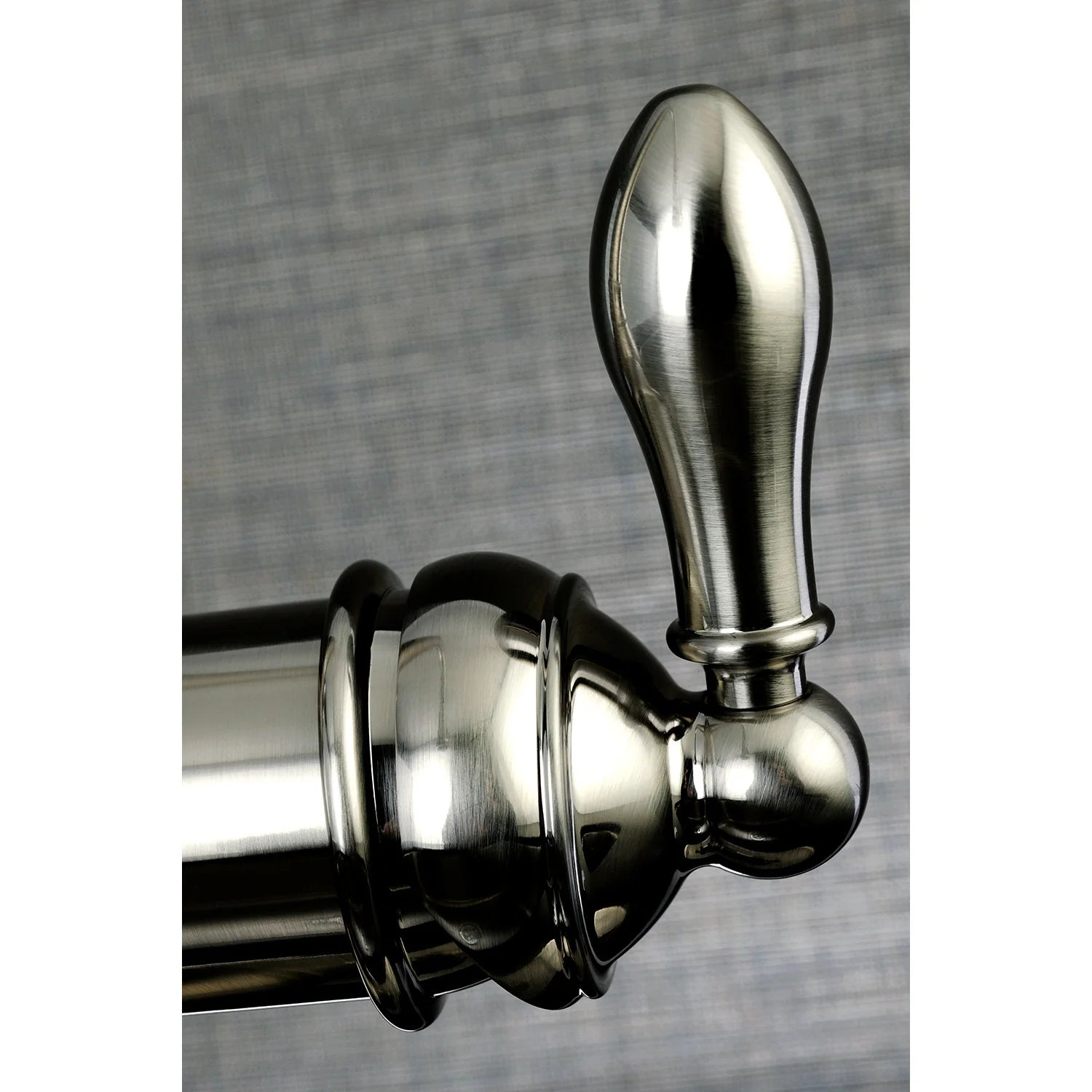 Brushed nickel pull-down sprayer head and hose connection detail