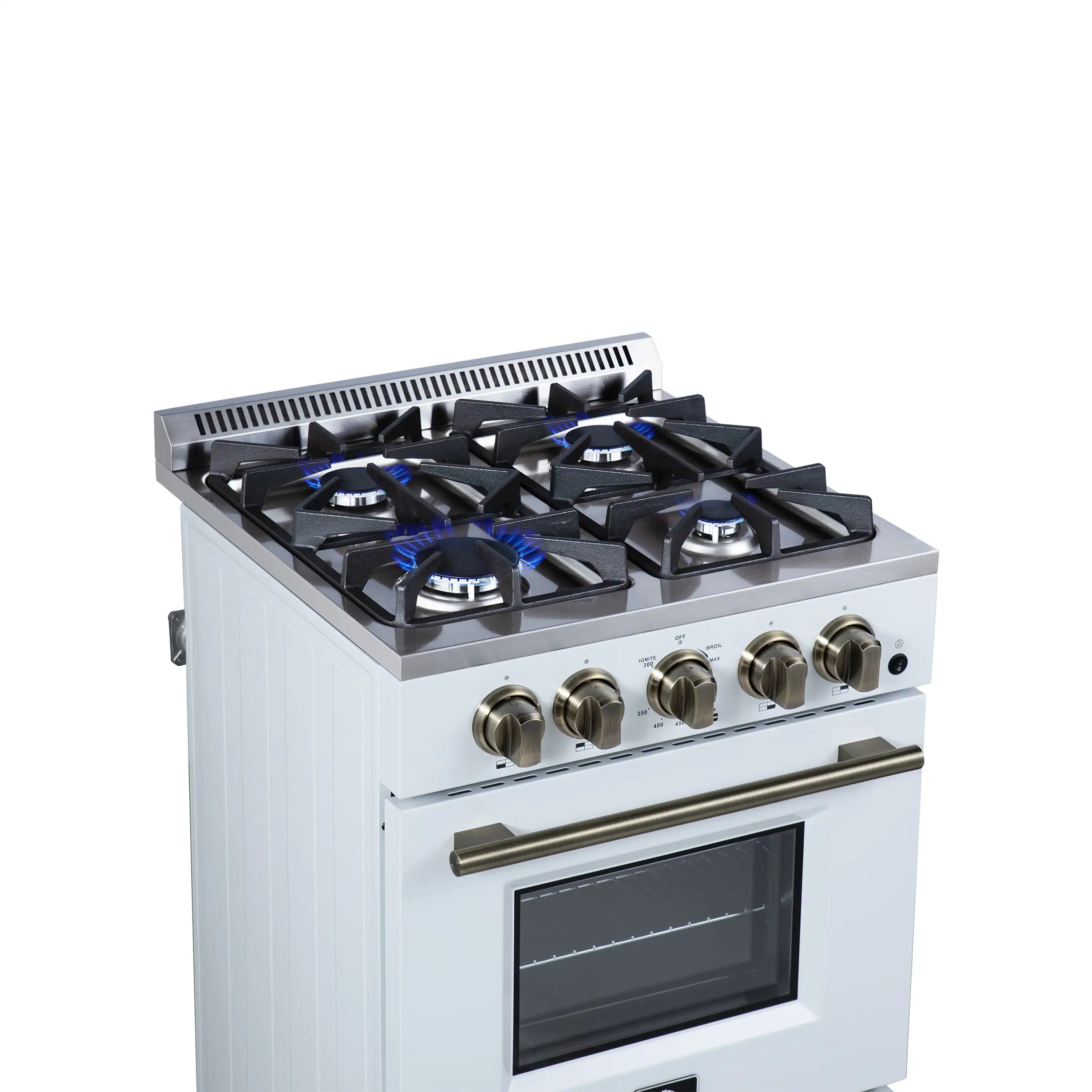 White freestanding gas range with black grates, lit burners, and brass-tone knobs
