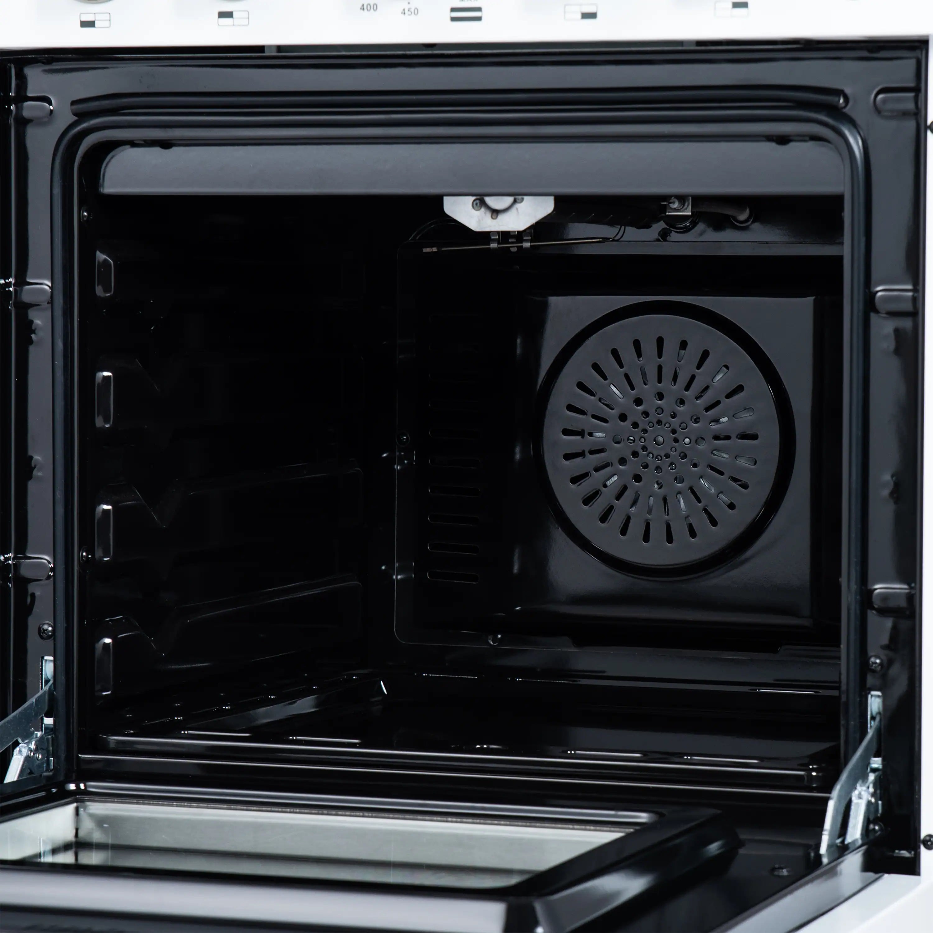 Gas oven interior with circular convection fan and black enamel cavity walls