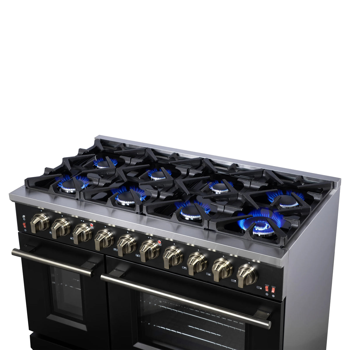 Black gas range cooktop with lit blue burners and brass control knobs