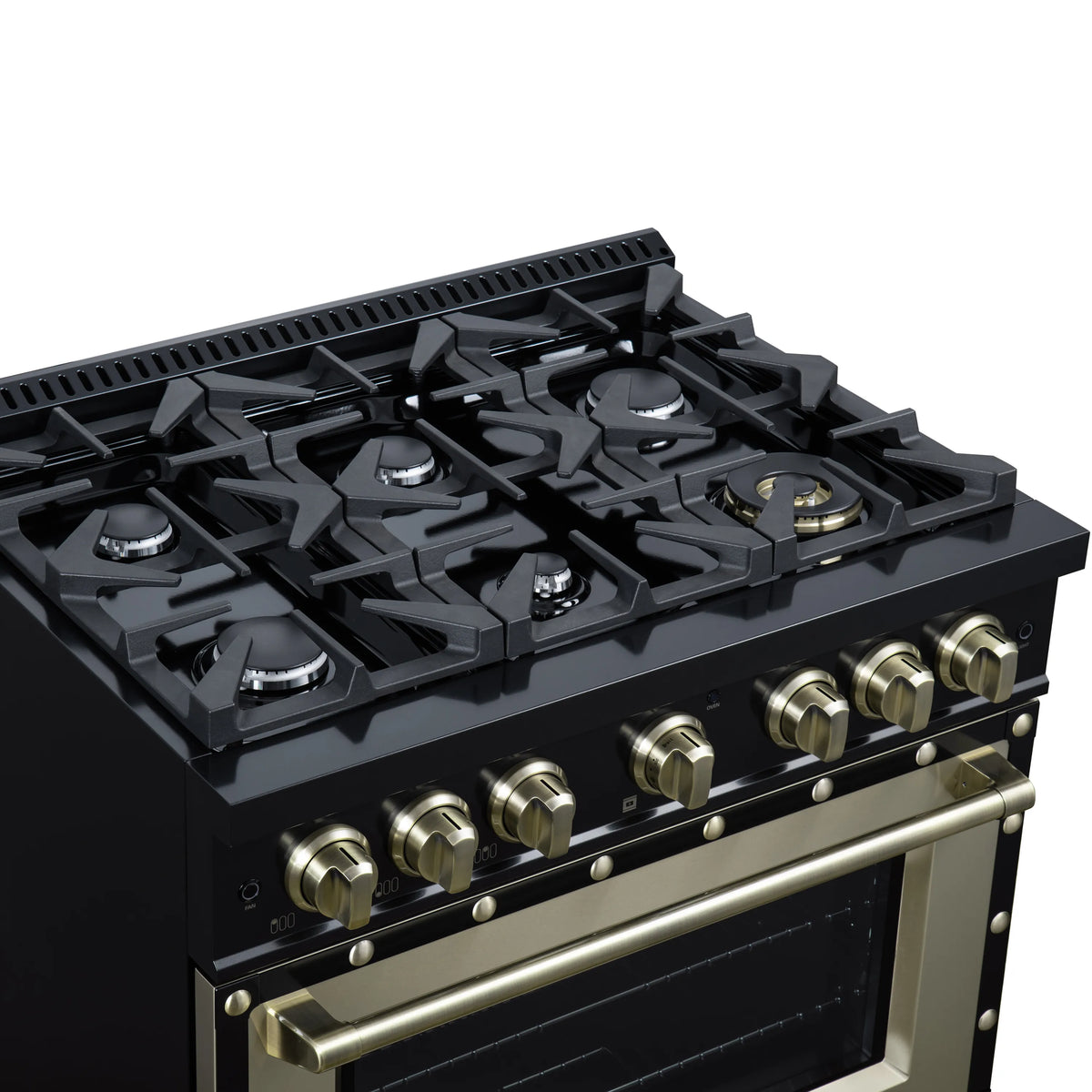 Black gas range cooktop with brass knobs and matching brass control panel trim.