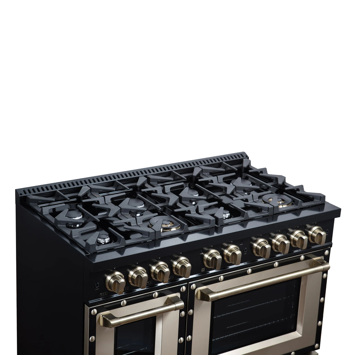 Black gas cooktop with cast burner grates and brass control knobs