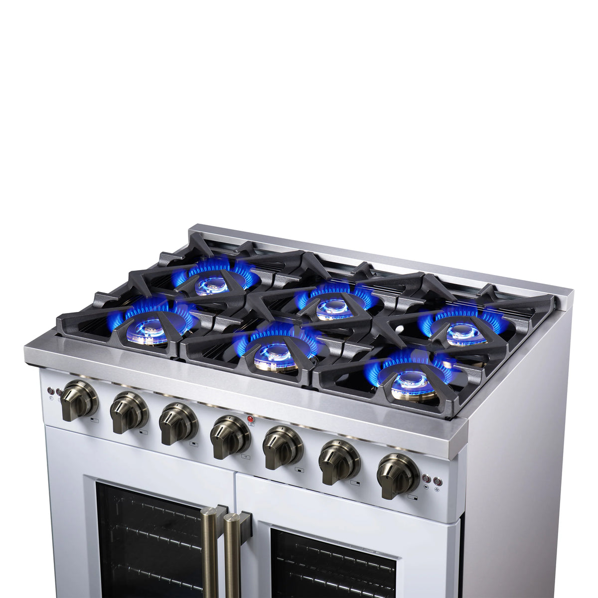 White freestanding gas range top with six blue flame burners and brass control knobs
