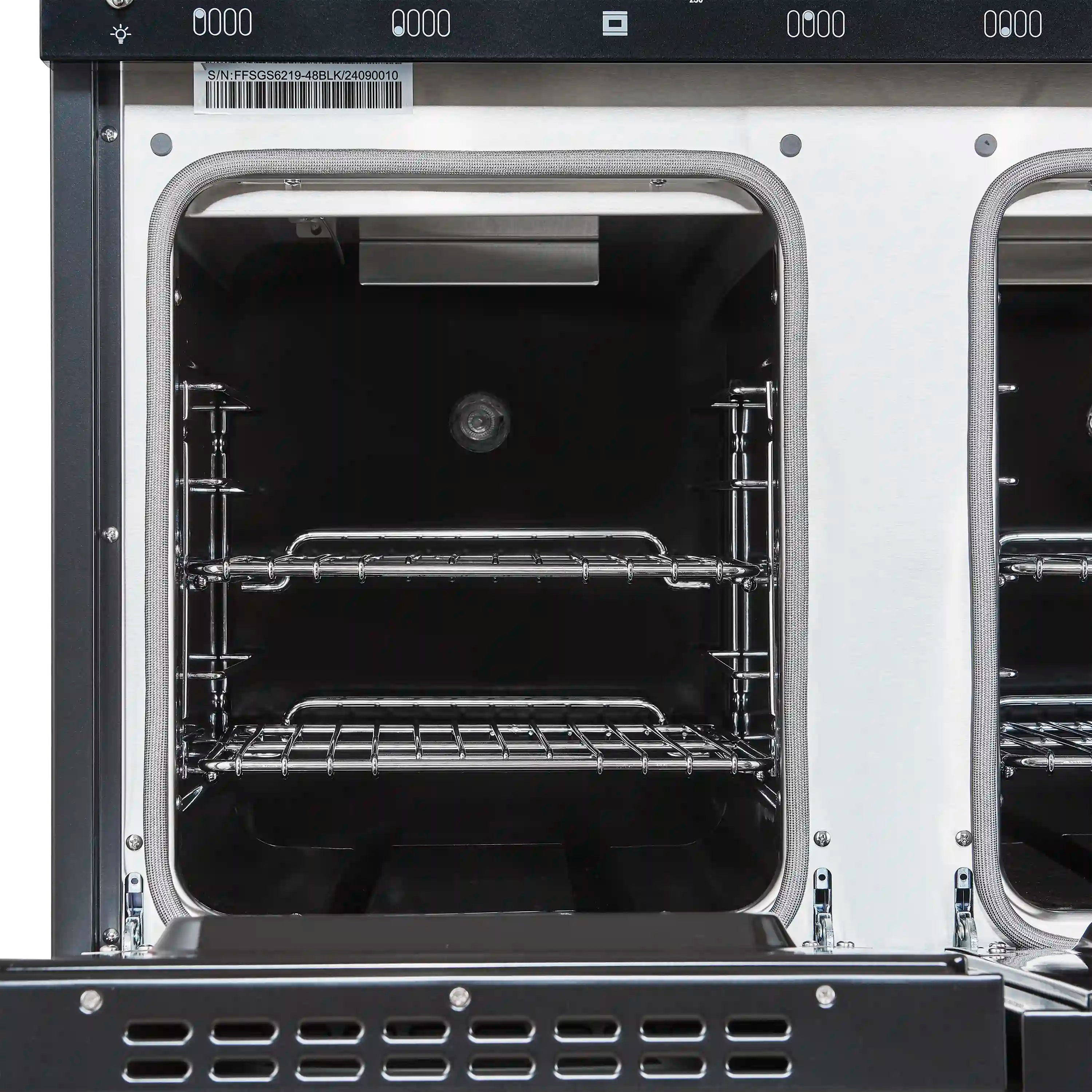 Gas oven door open showing interior racks and side support rails