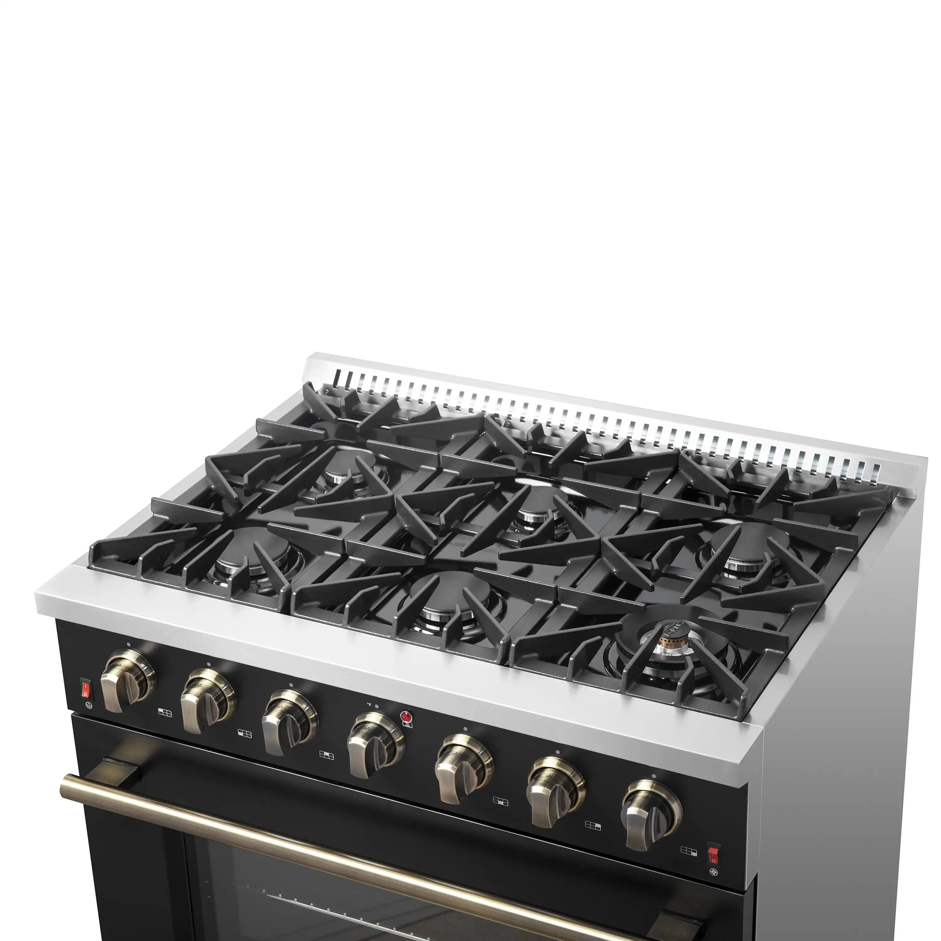 Black gas cooktop with cast-iron style grates and brass-finish control knobs
