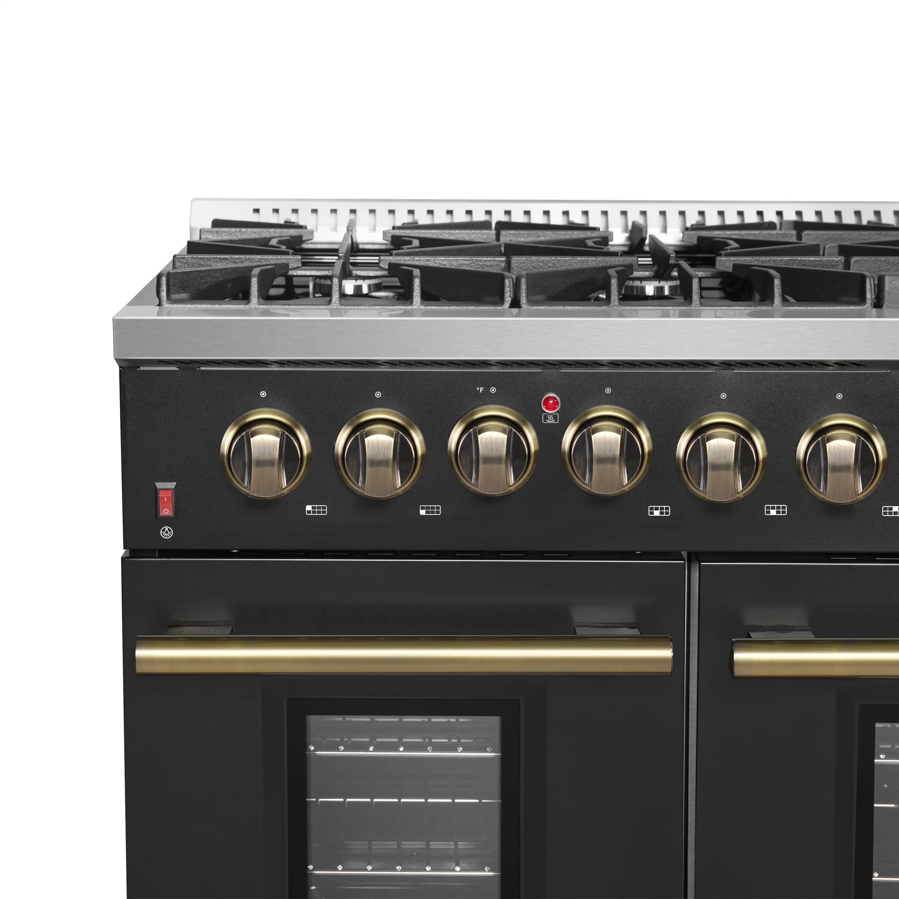 Black gas range cooktop with antique brass-trimmed control knobs