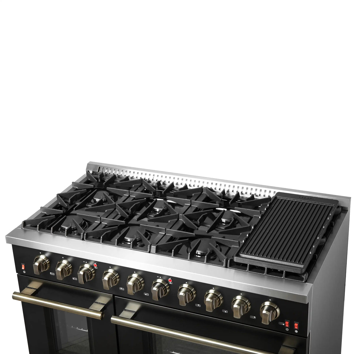 Black gas range cooktop with cast-iron grates, brass knobs, and griddle plate
