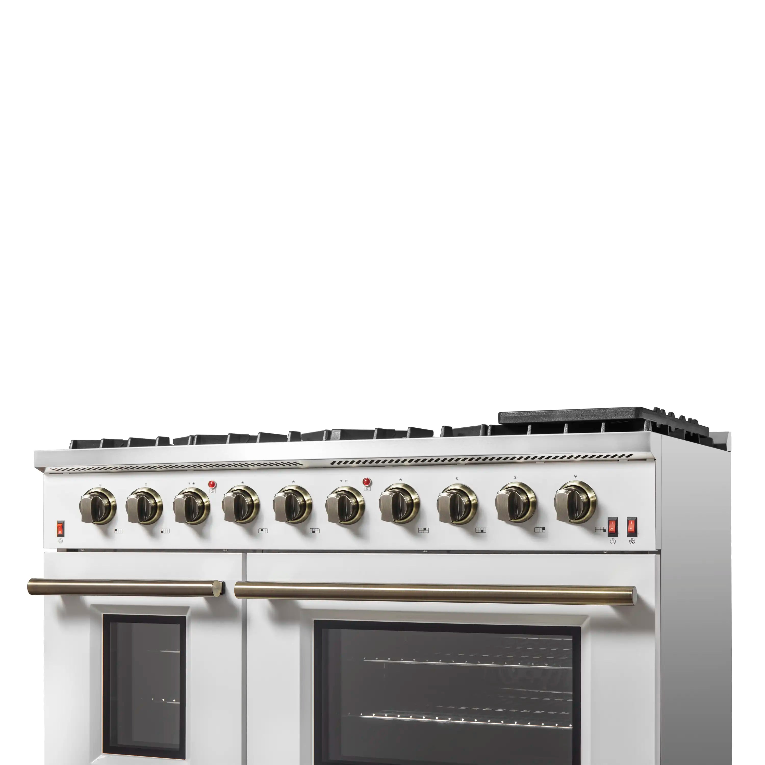 White gas range top control panel with brass knobs and two lower glass oven doors
