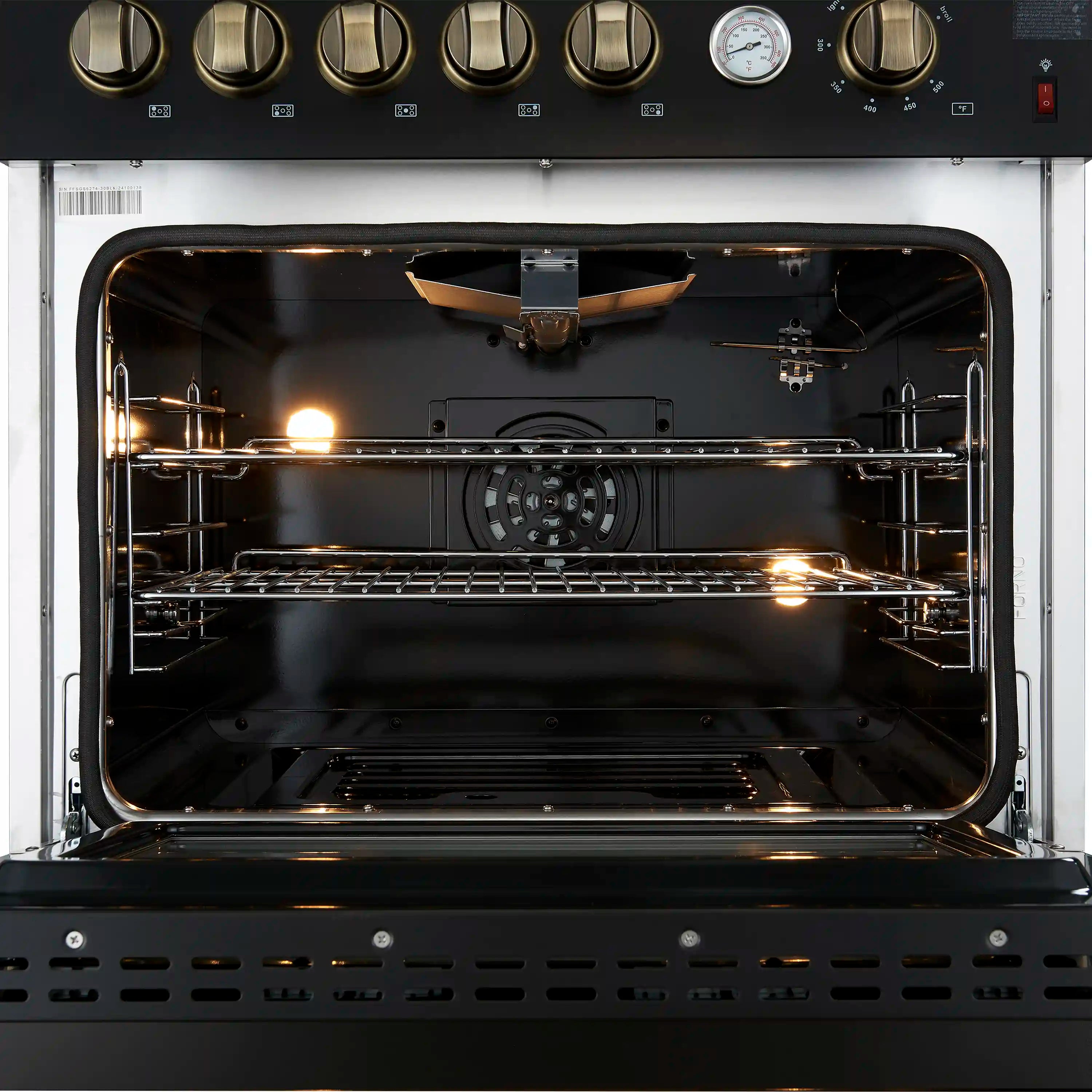 Convection oven interior with rack, burner area, and lit oven ceiling