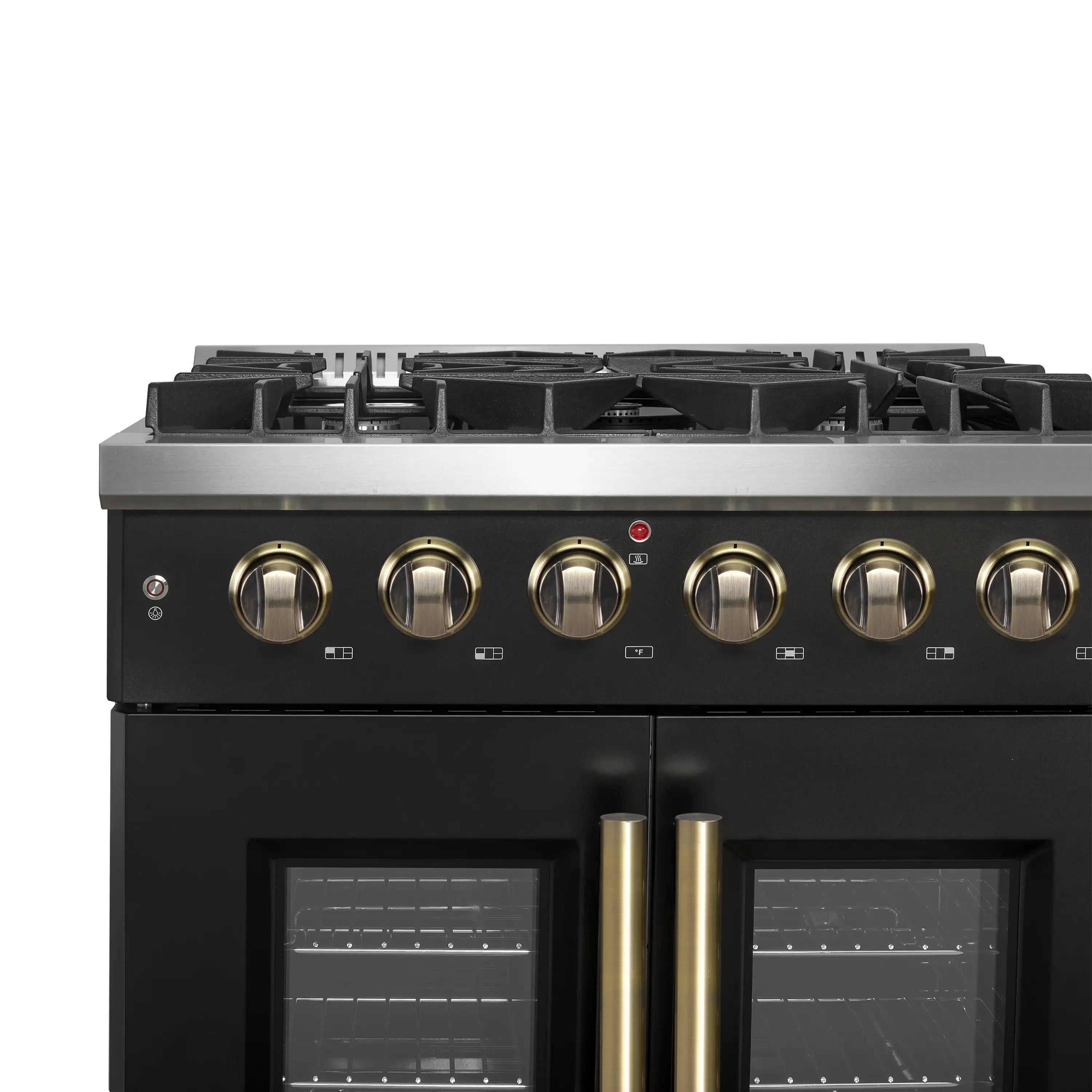 Black gas range control panel with brass knobs and closed French oven doors