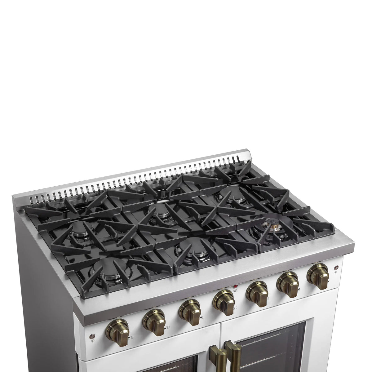 White gas range cooktop close-up with black burner grates and control panel