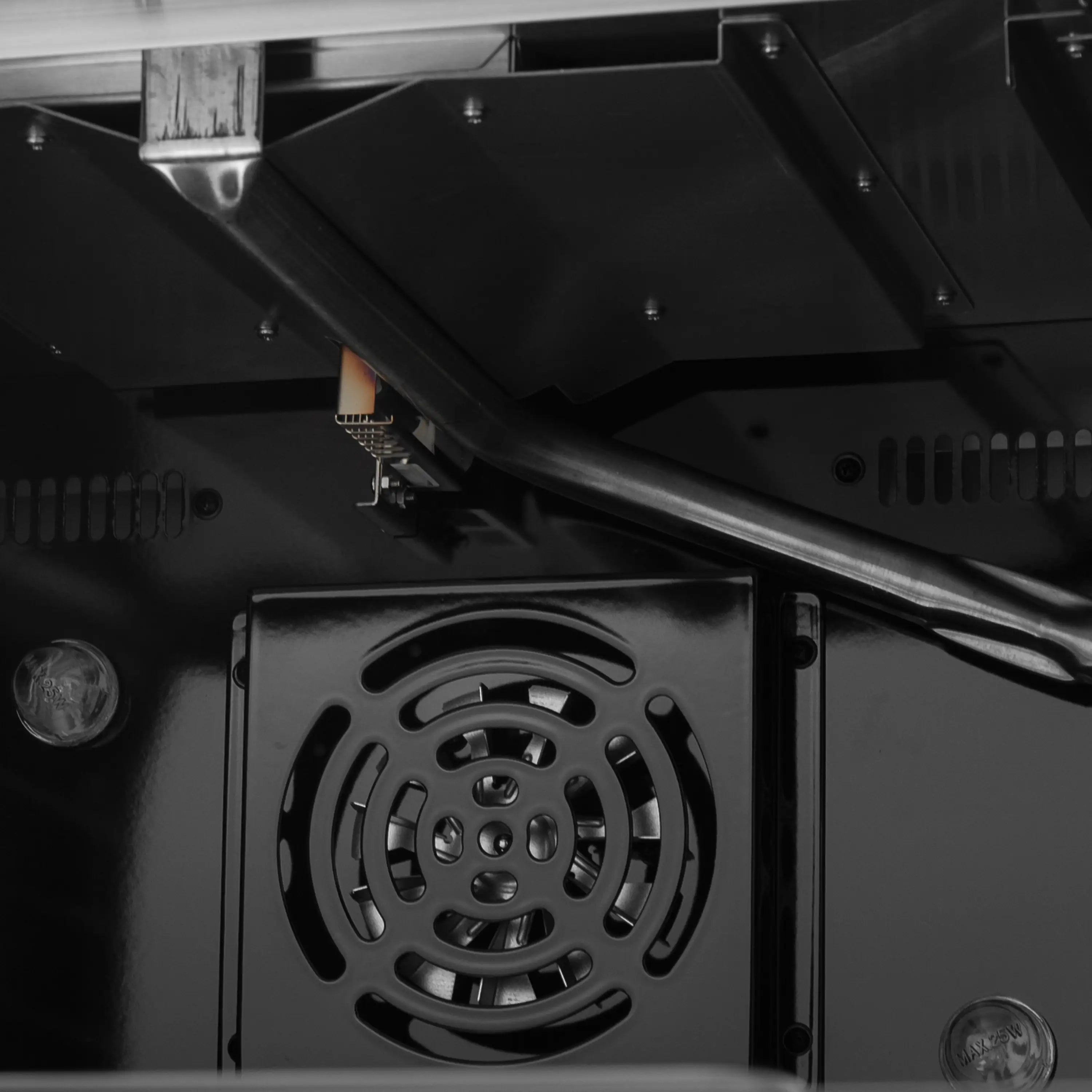 Convection oven rear view showing circular fan housing and back components