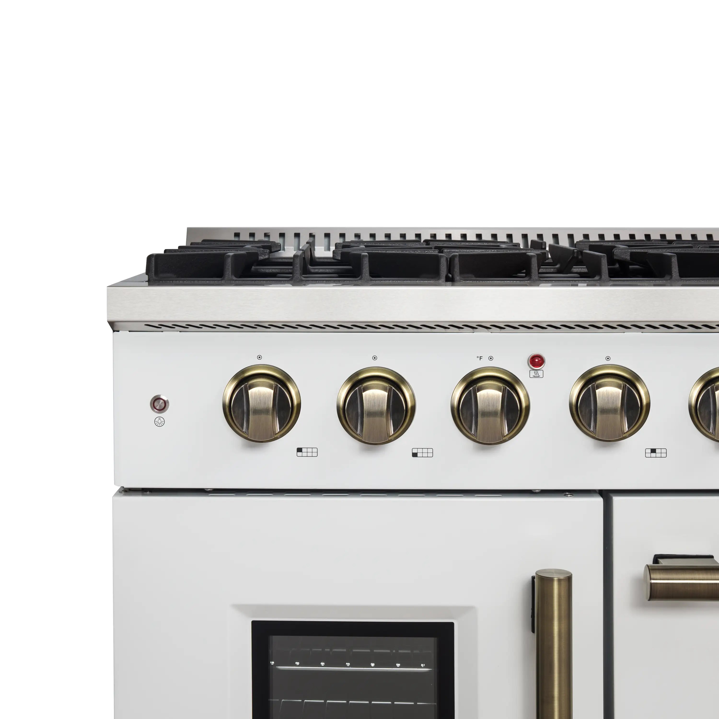 White gas range cooktop with black grates and antique brass burner knobs