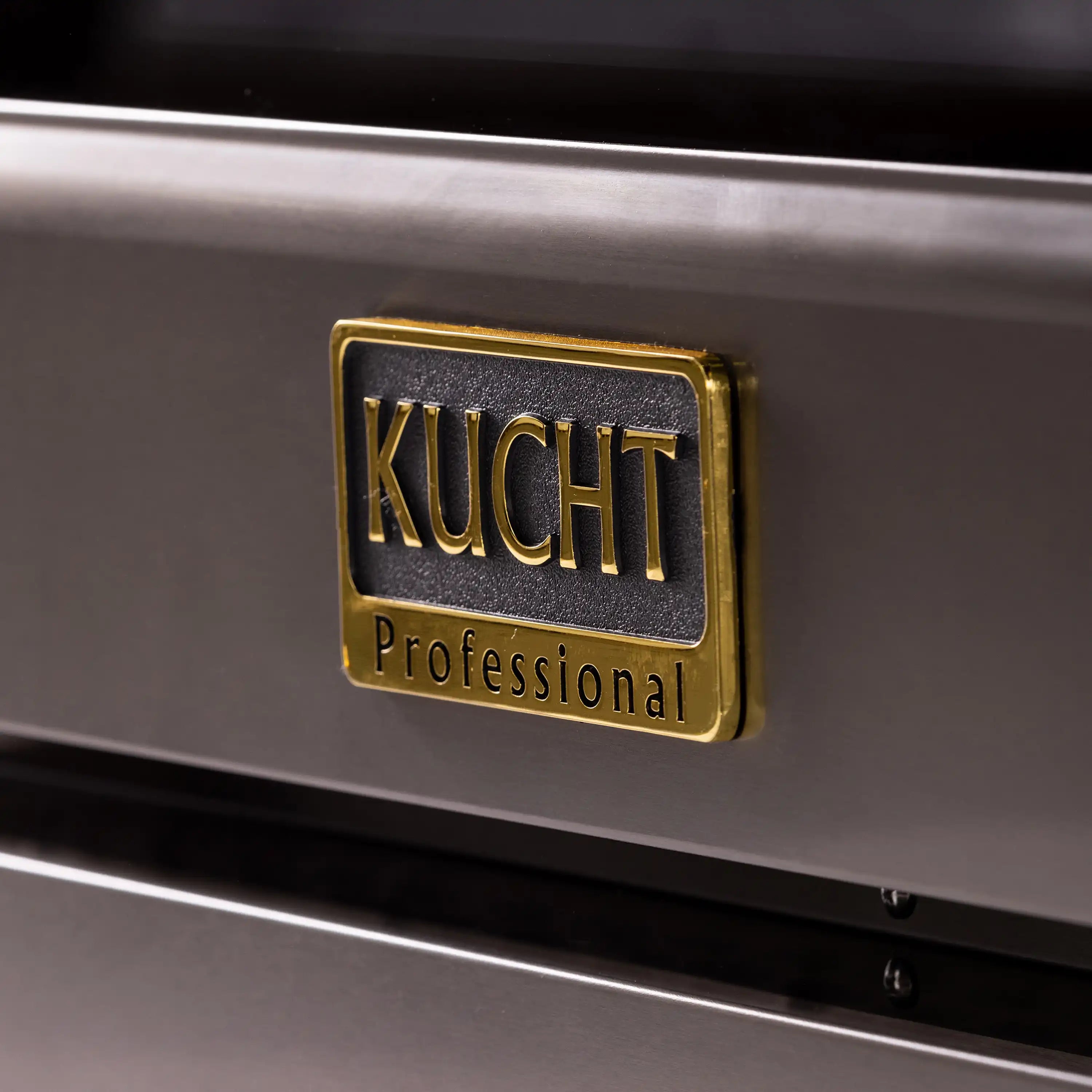 Kucht Professional emblem on dark titanium stainless range front panel