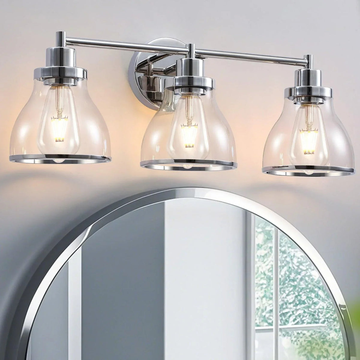Silver 3-light vanity light with three clear glass shades and round wall mount