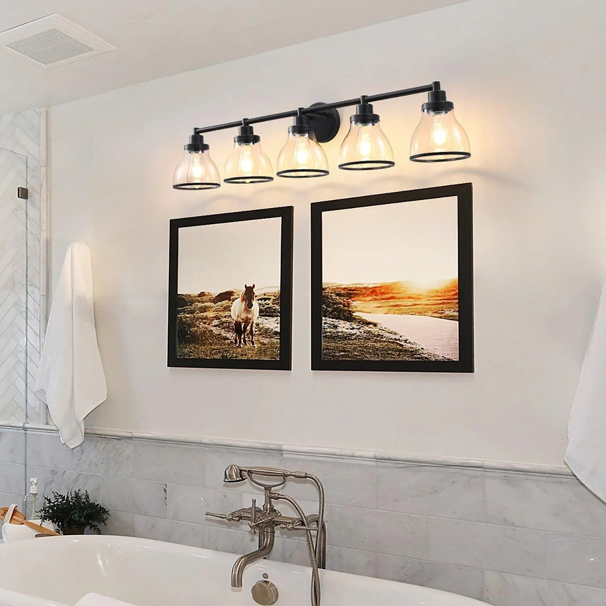 Black 5-light bathroom vanity light above sink with clear glass dome shades