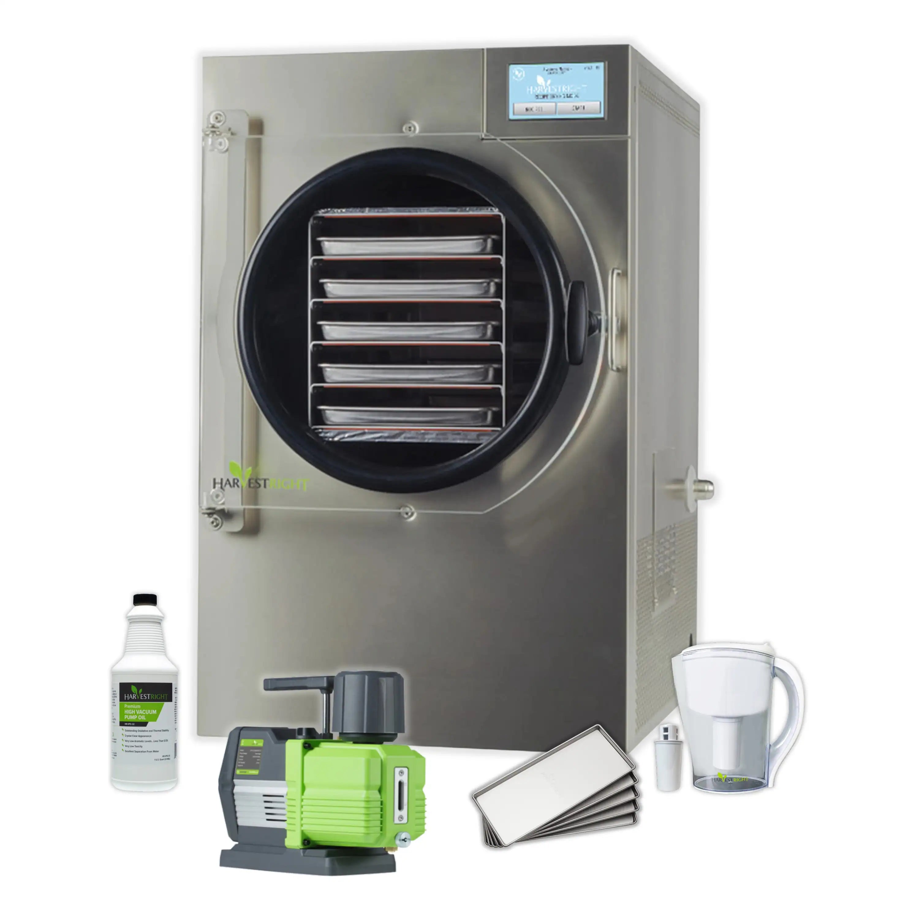 Freeze dryer with vacuum pump, accessories and bottles on floor beside the machine