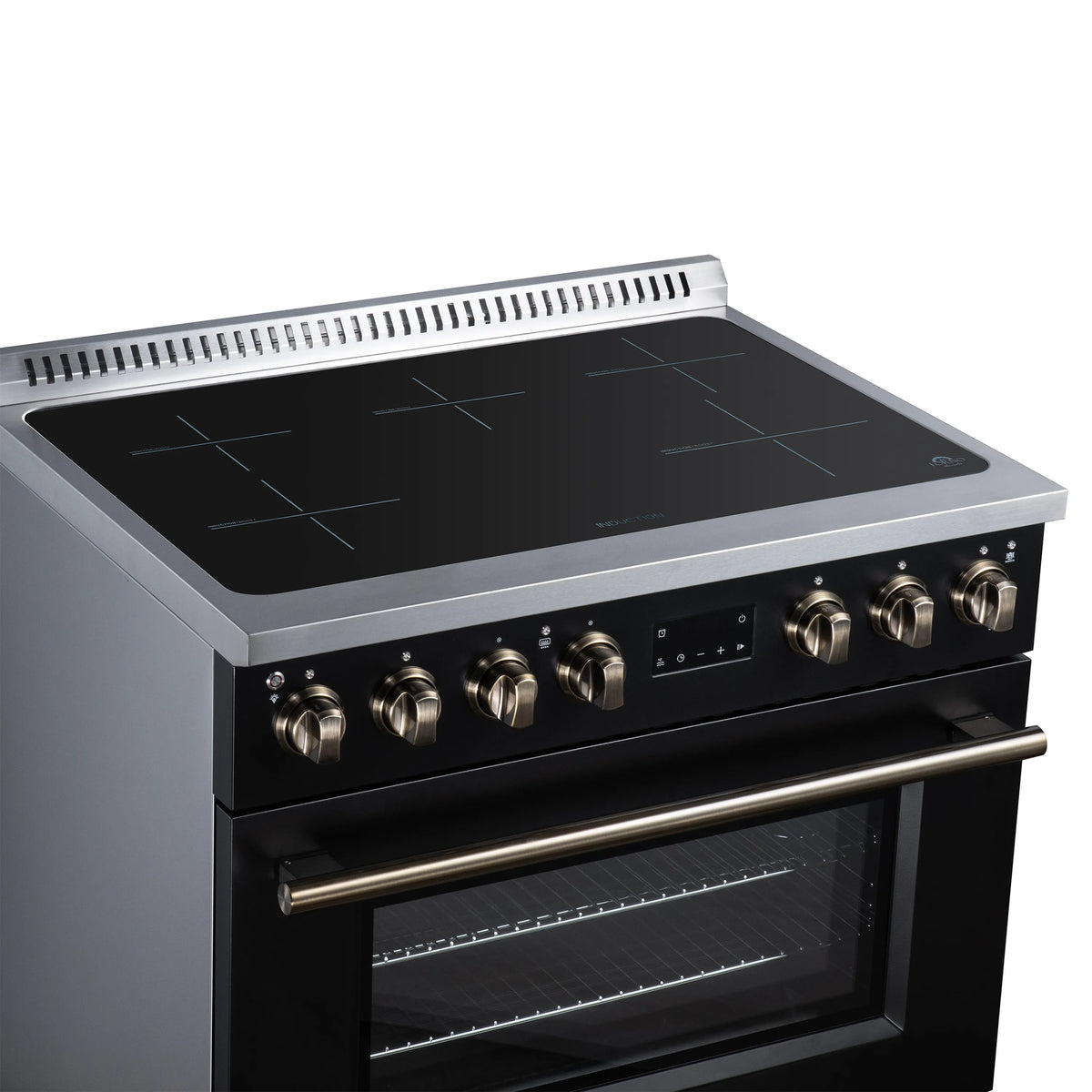 Black induction cooktop with brass-trim knob controls and sleek glass surface