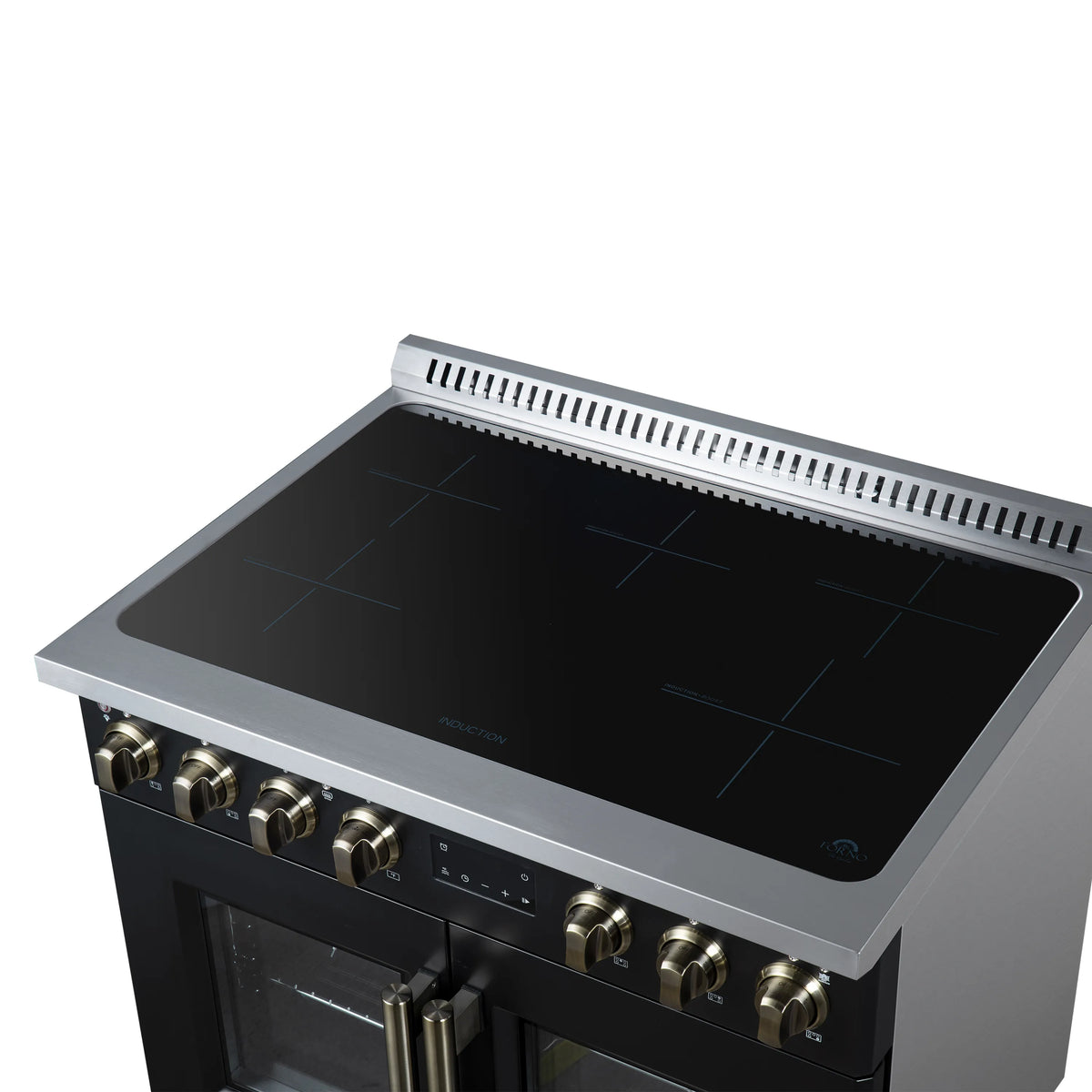 Black induction cooktop surface with brass knob row and venting on top