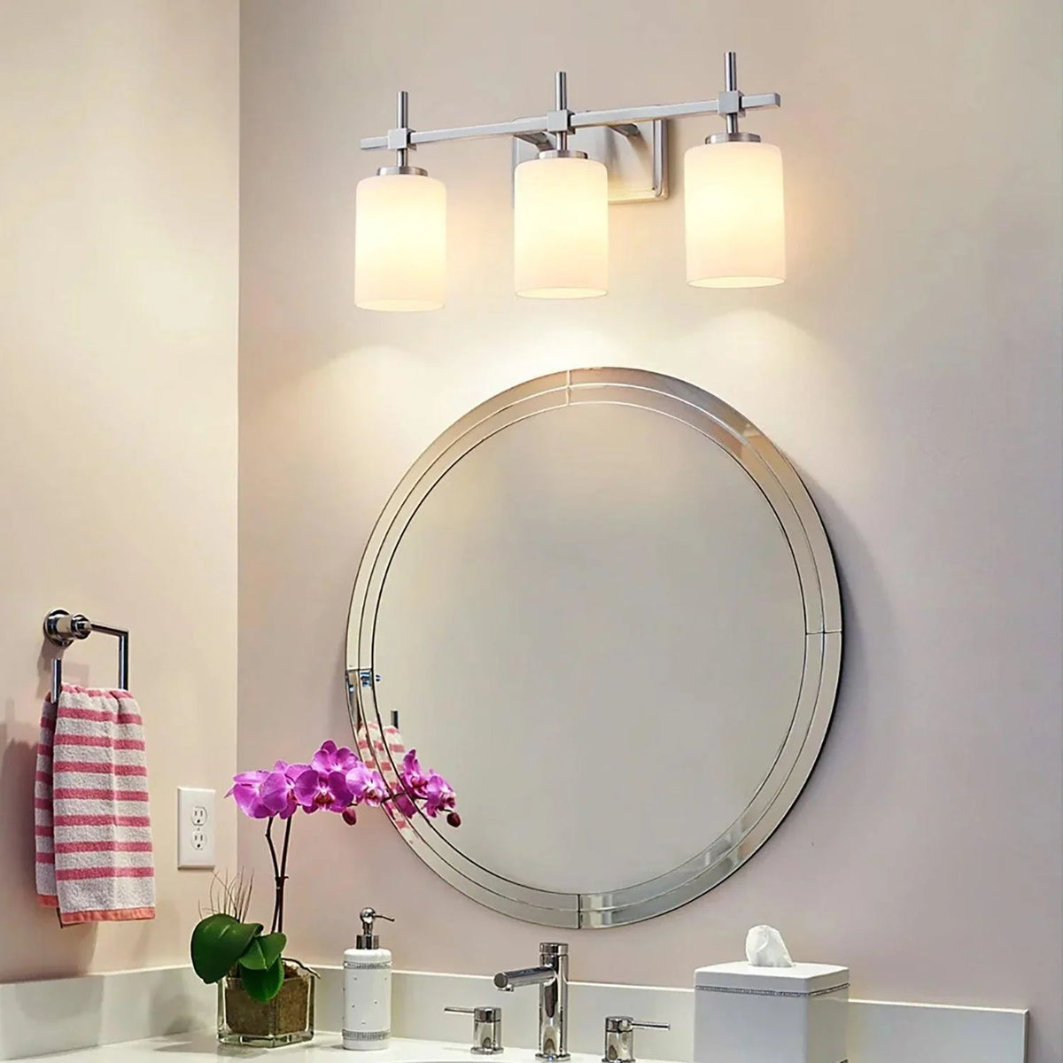 Silver 3-light bathroom vanity light with frosted glass shades and metal mounting bar