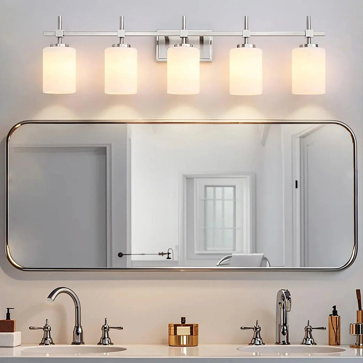 Linear 5-light bathroom vanity light with frosted glass shades and metal mounting arms