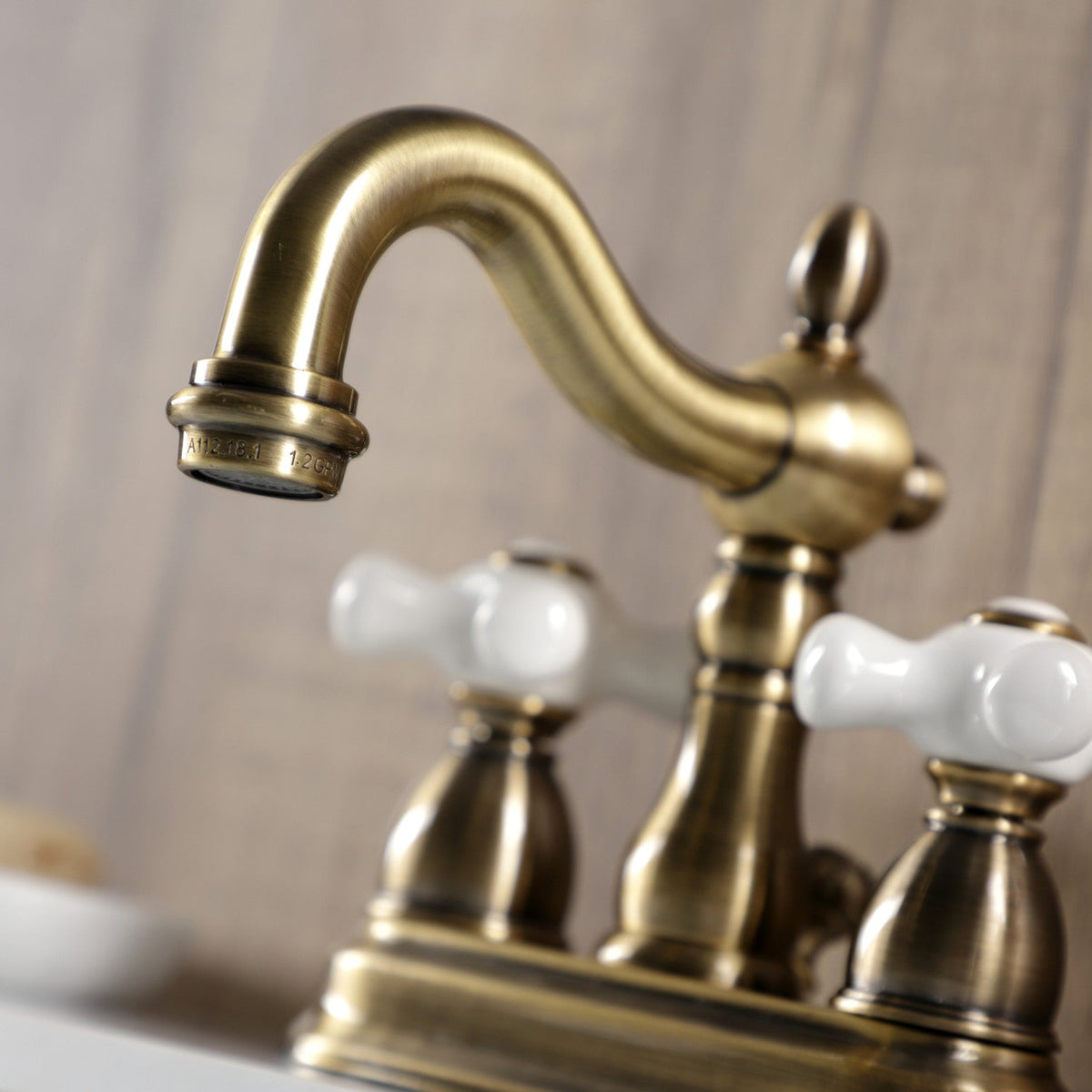 Heritage Double-Handle 4" Centerset Bathroom Faucet with Pop-Up Drain in Antique Brass