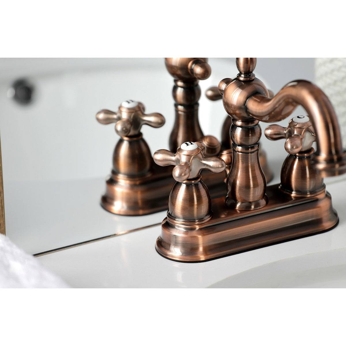 Heritage Double-Handle 4" Centerset Bathroom Faucet with Pop-Up Drain in Antique Copper