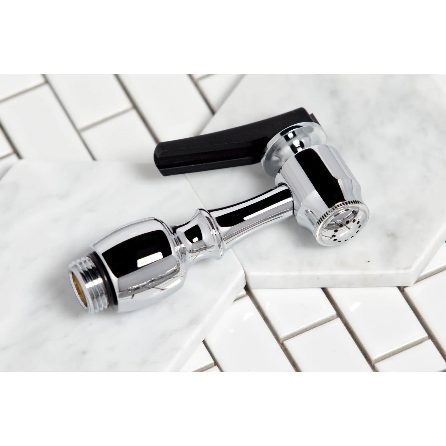Polished chrome spray head and spout connection on kitchen faucet