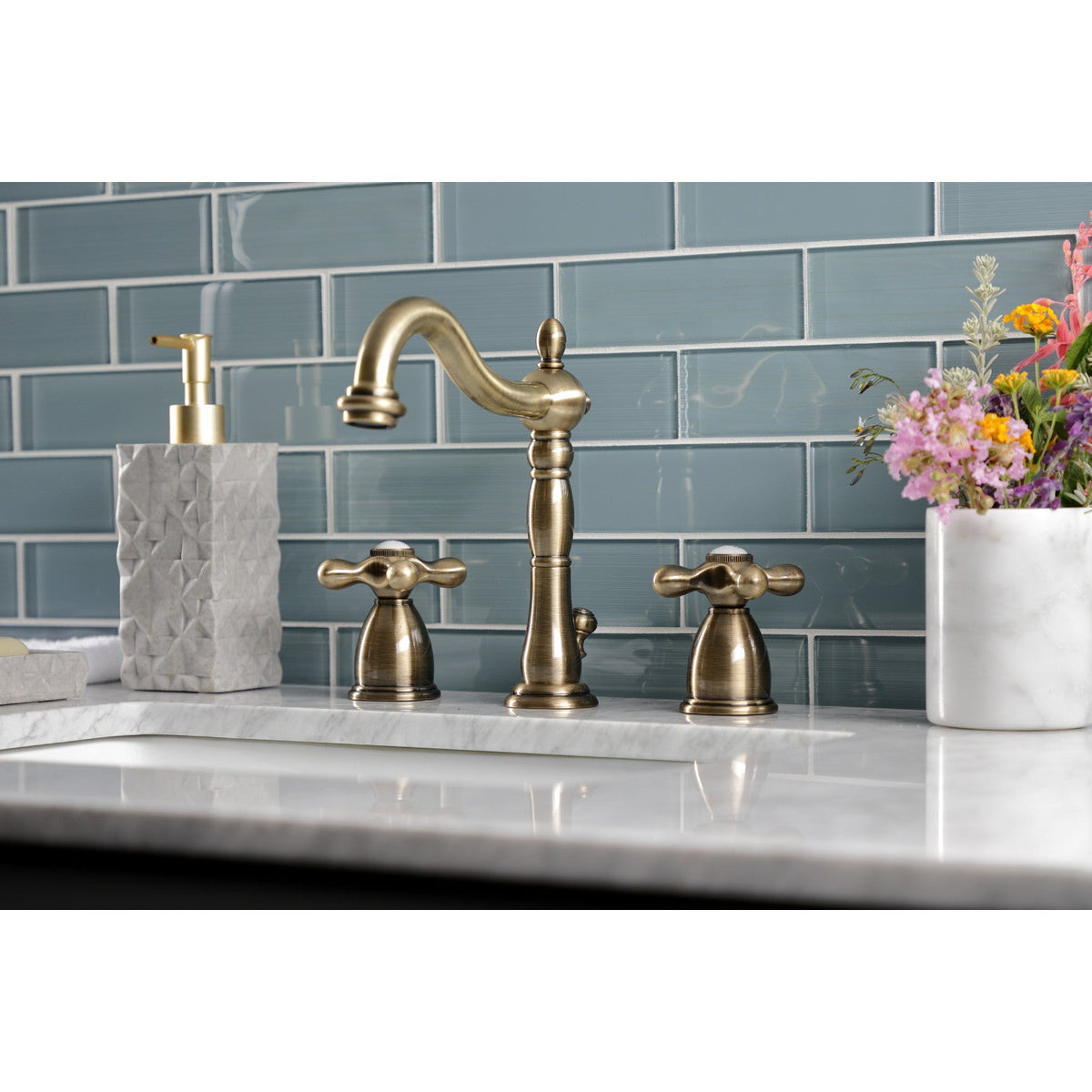 Heritage Widespread Bathroom Faucet with Brass Pop-Up in Antique Brass
