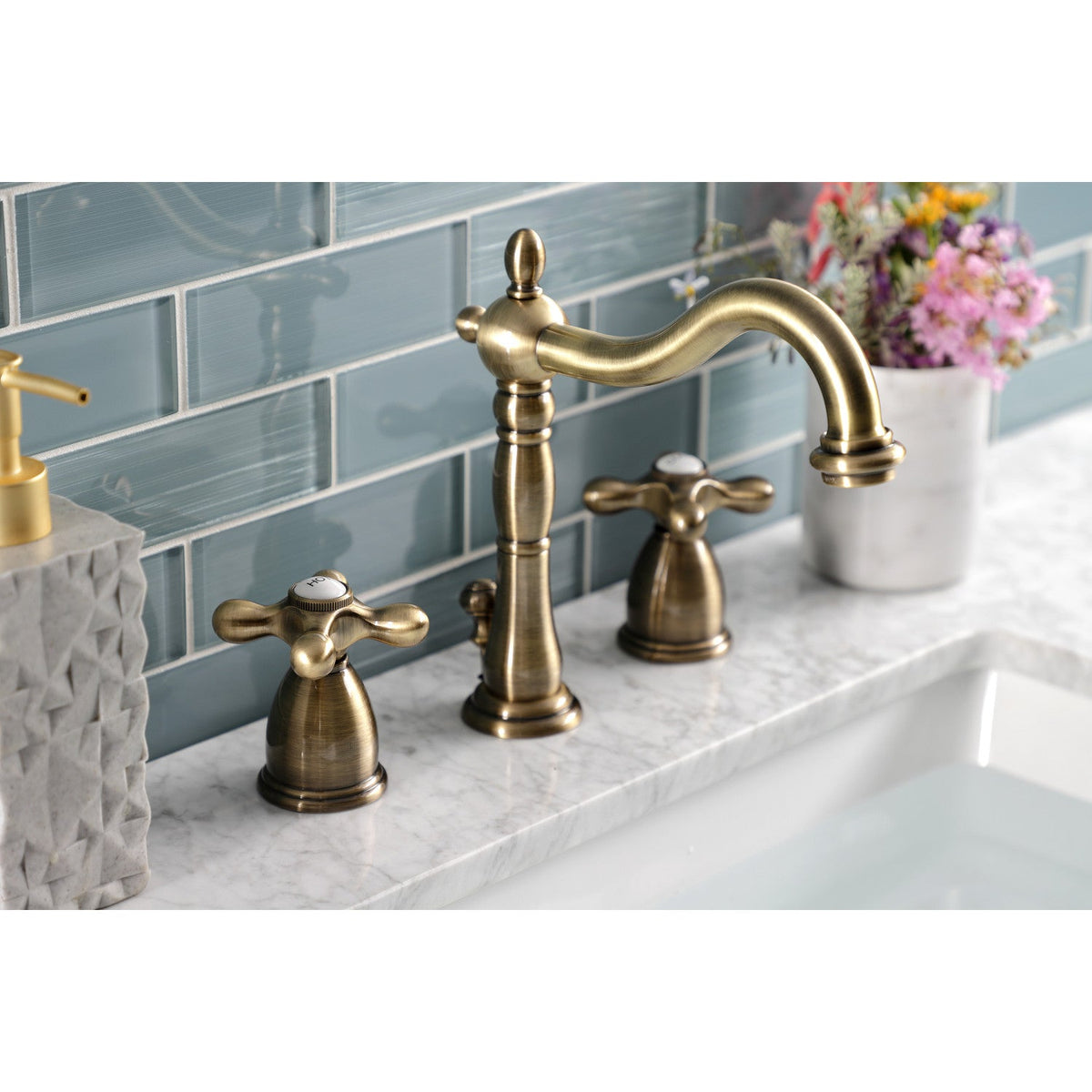 Heritage Widespread Bathroom Faucet with Brass Pop-Up in Antique Brass