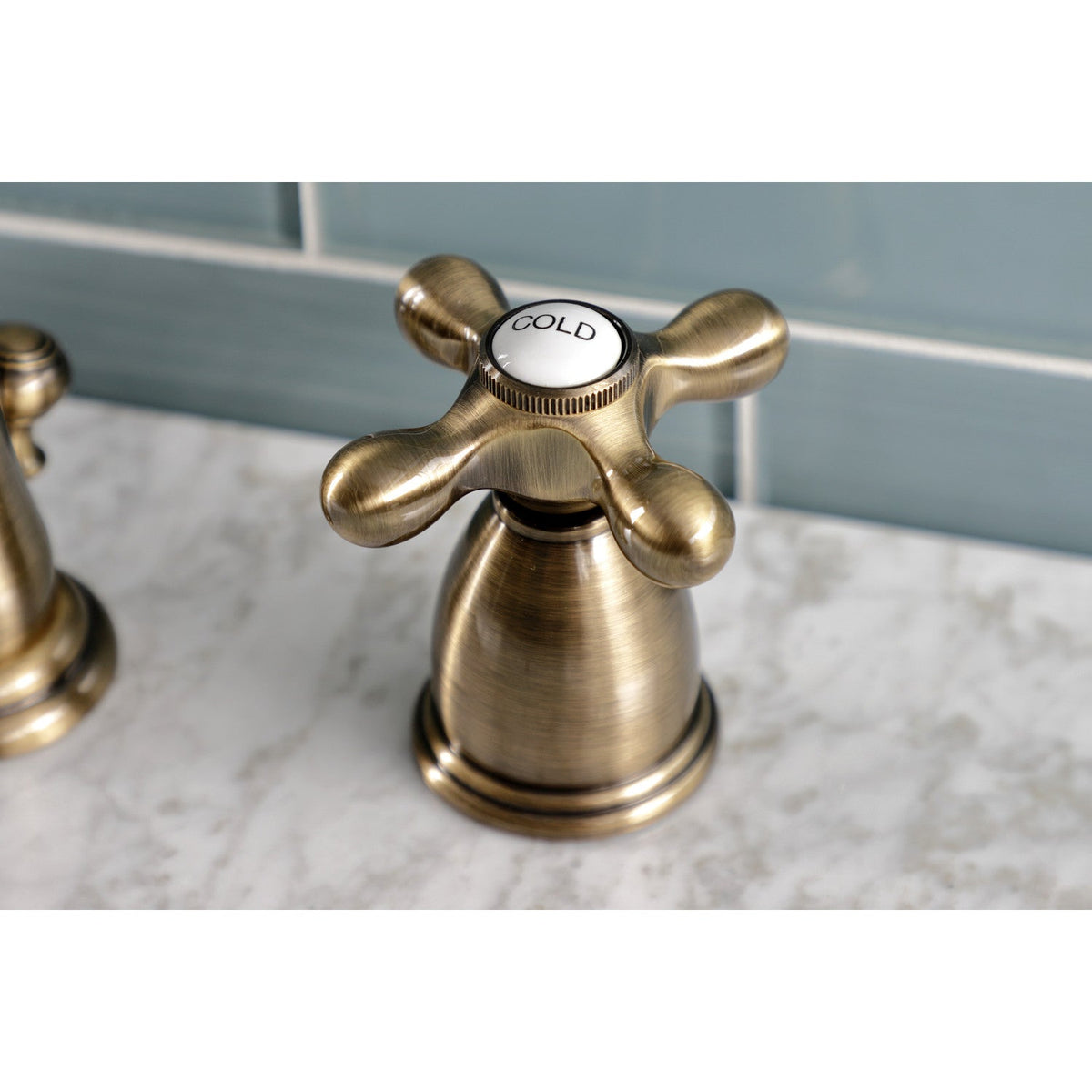 Heritage Widespread Bathroom Faucet with Brass Pop-Up in Antique Brass