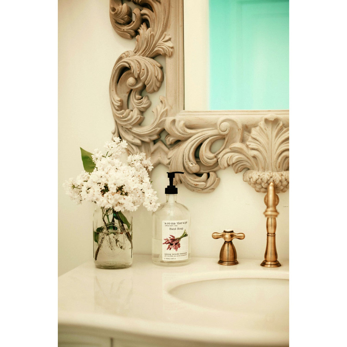 Heritage Widespread Bathroom Faucet with Brass Pop-Up in Antique Brass