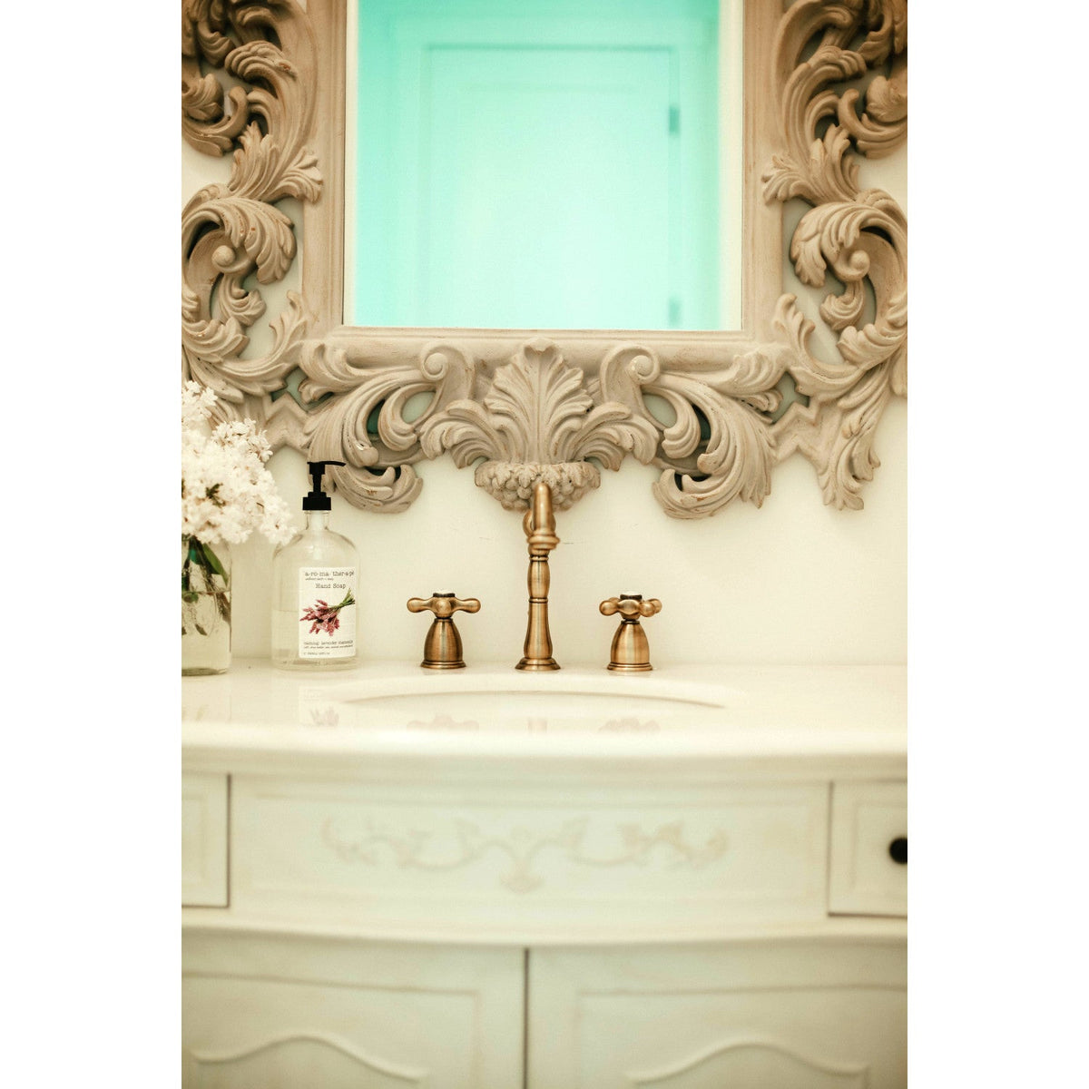 Heritage Widespread Bathroom Faucet with Brass Pop-Up in Antique Brass