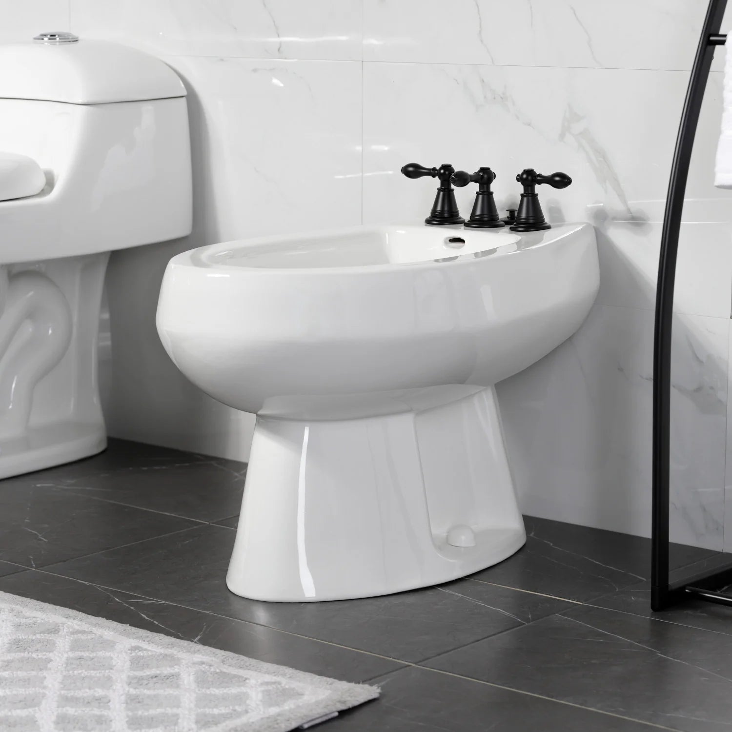 Matte black three-handle bidet faucet with pop-up, Victorian style