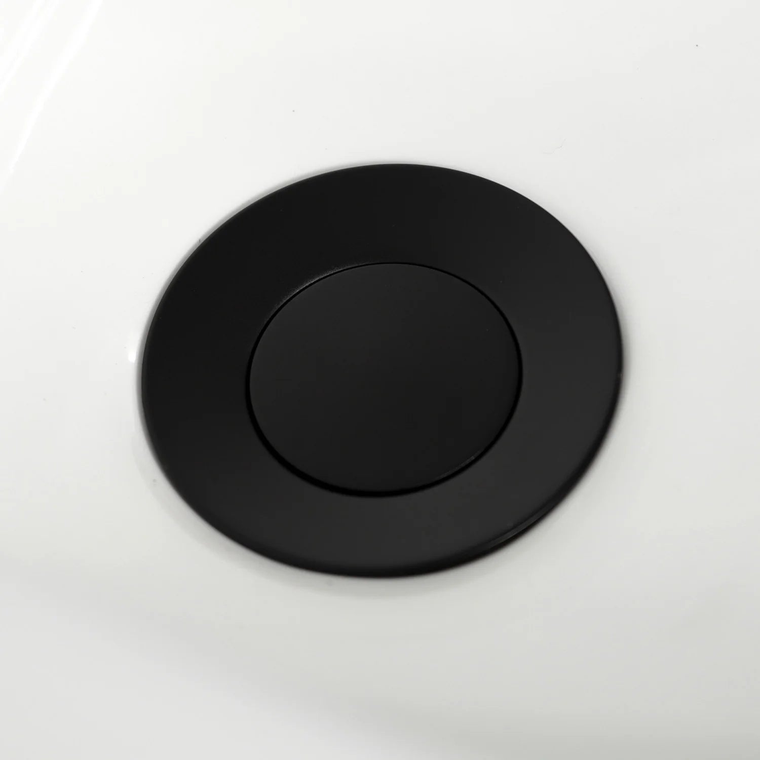 Matte black circular deck plate for bidet faucet controls